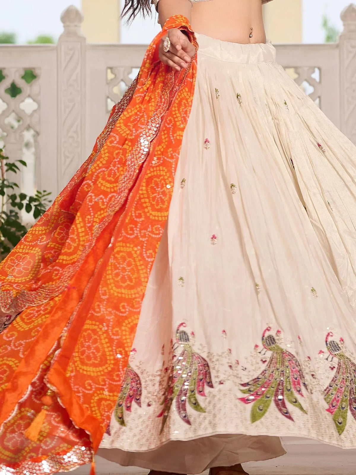 Cream lehenga with peacock embroidery and orange dupatta, Indian ethnic wear