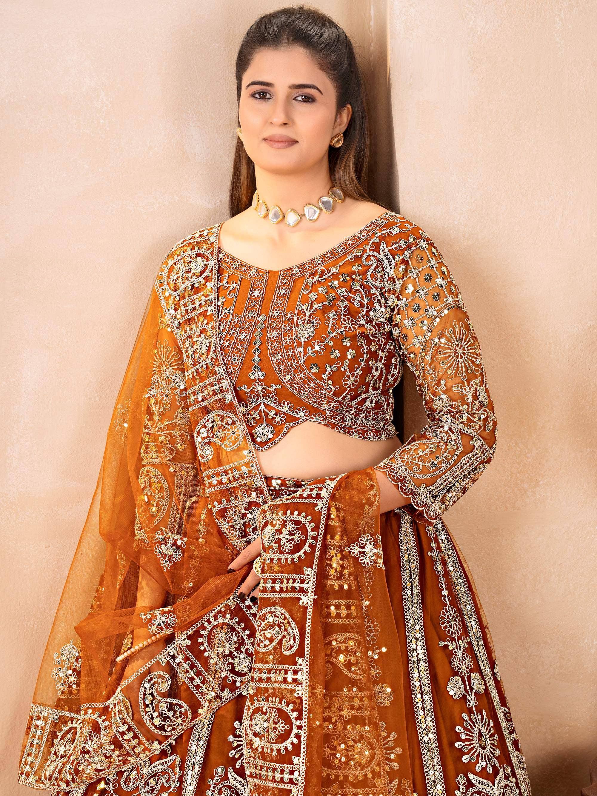 Fabulous Orange Embroidered Net Reception Wear Lehenga Choli