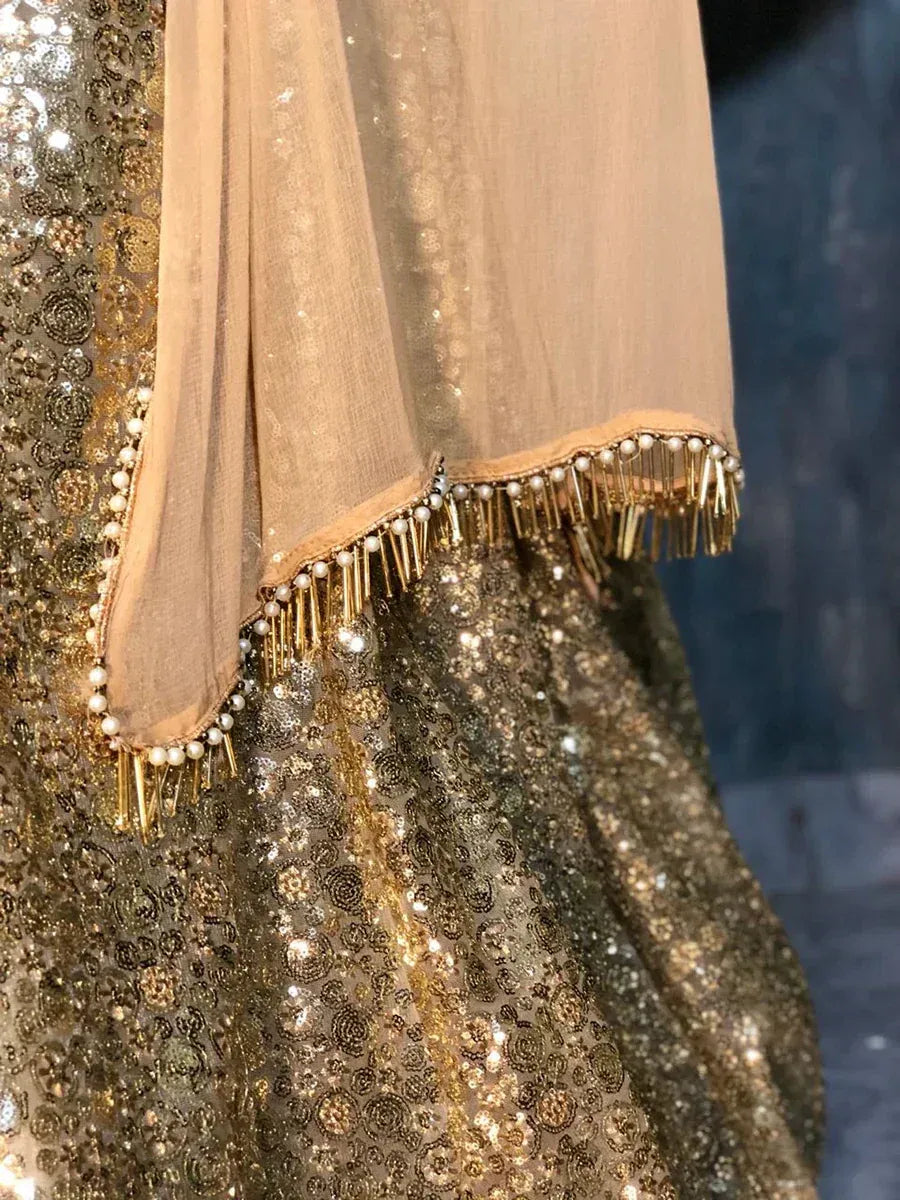 Gold sequin lehenga with pearl and tassel dupatta border, ethnic Indian wear