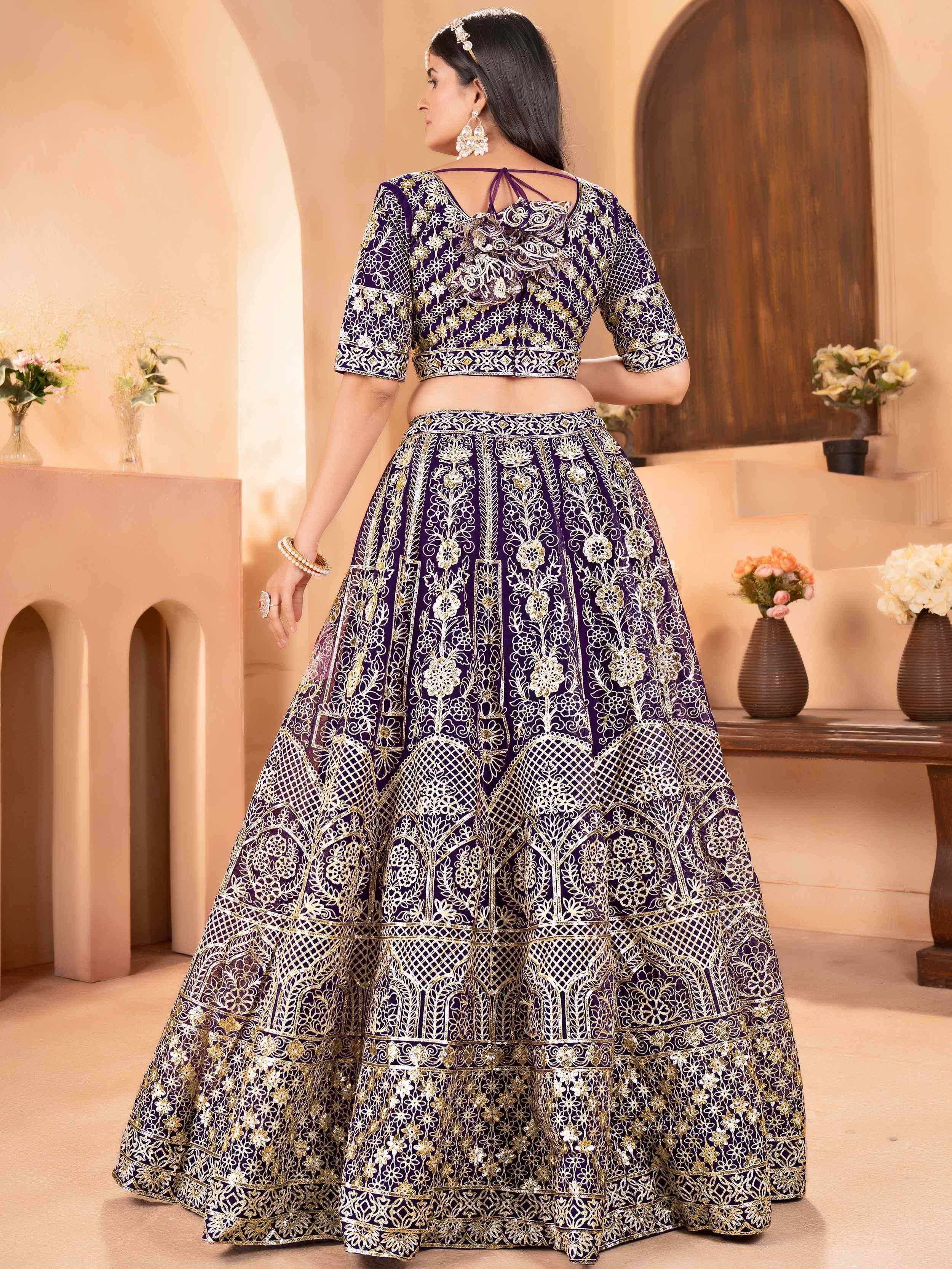 Enchanting Purple Zari Embroidered Net Reception Wear Lehenga Choli