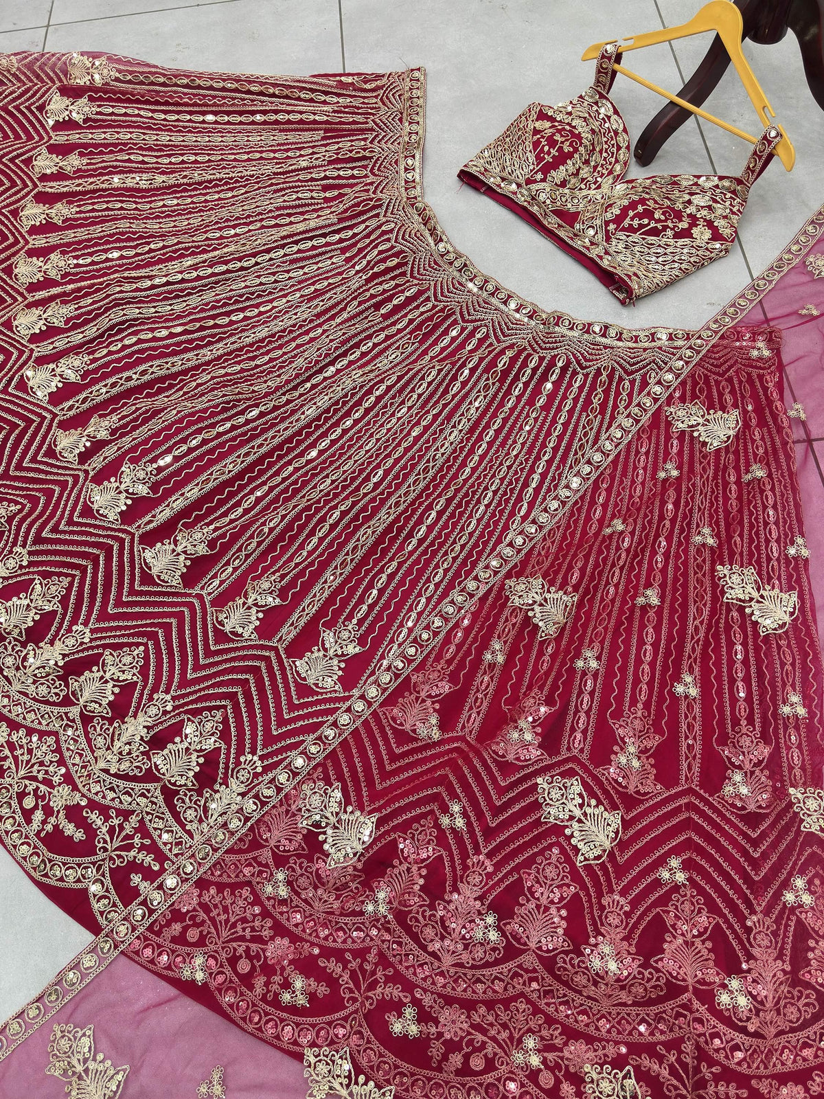 Terrific Pink Codding Embroidered Net Engagement Wear Lehenga Choli