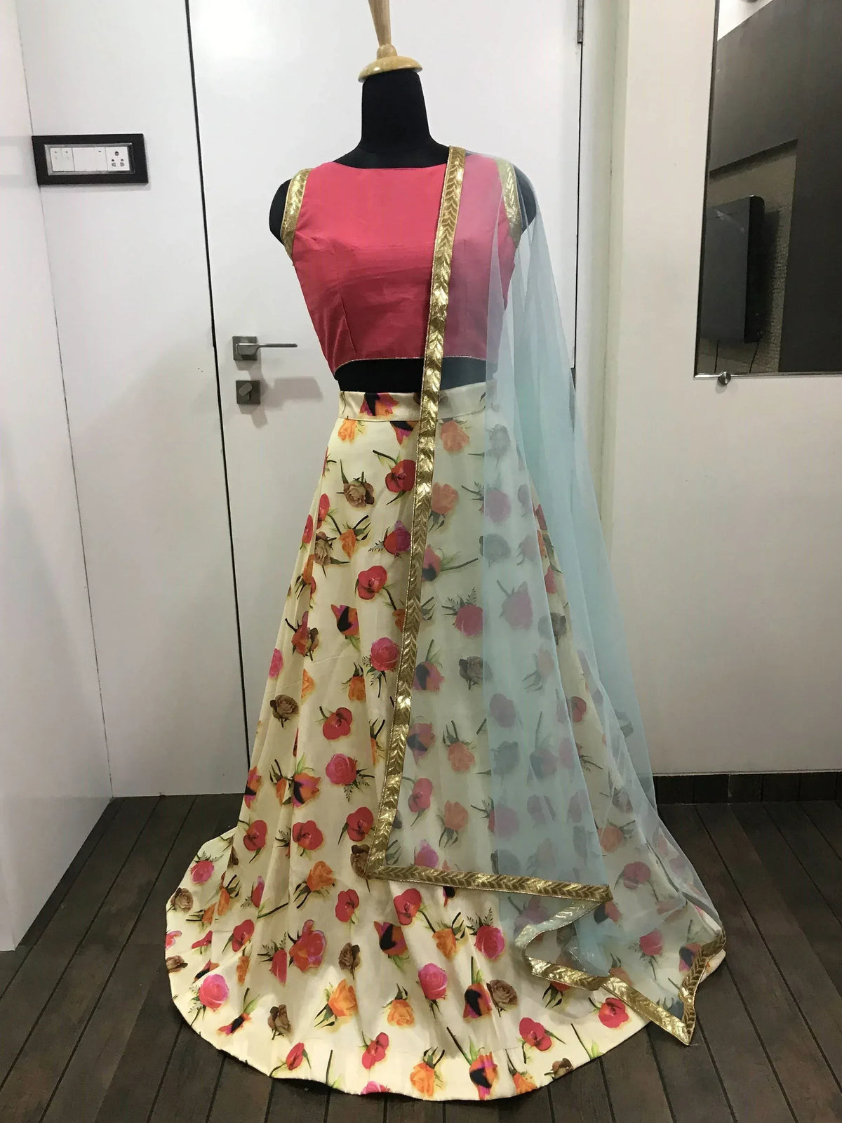Pink floral lehenga choli with gold trim and sheer dupatta, Indian ethnic wear