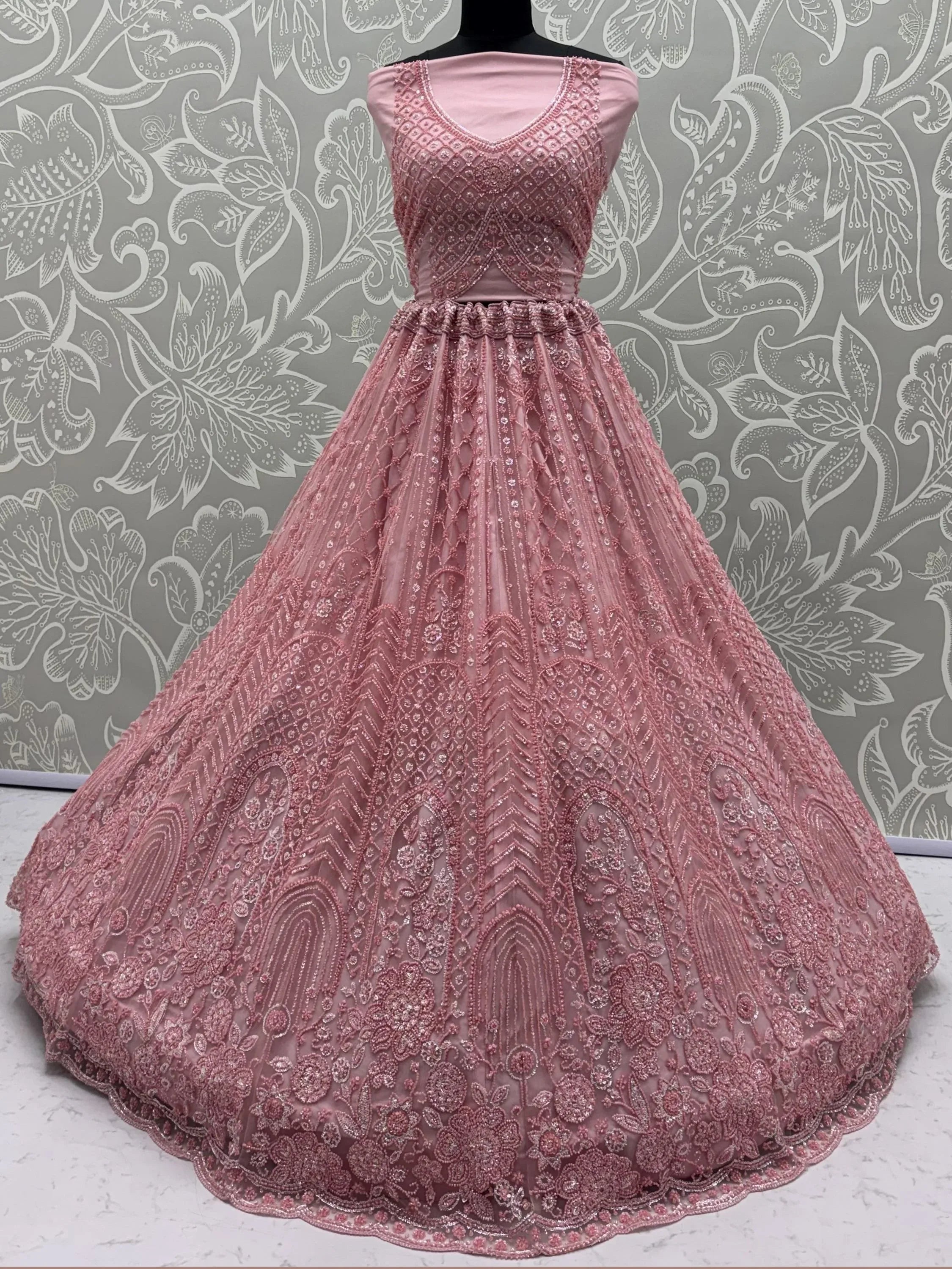 Monochrome Pink Embroidered Net Reception Wear Lehenga Choli