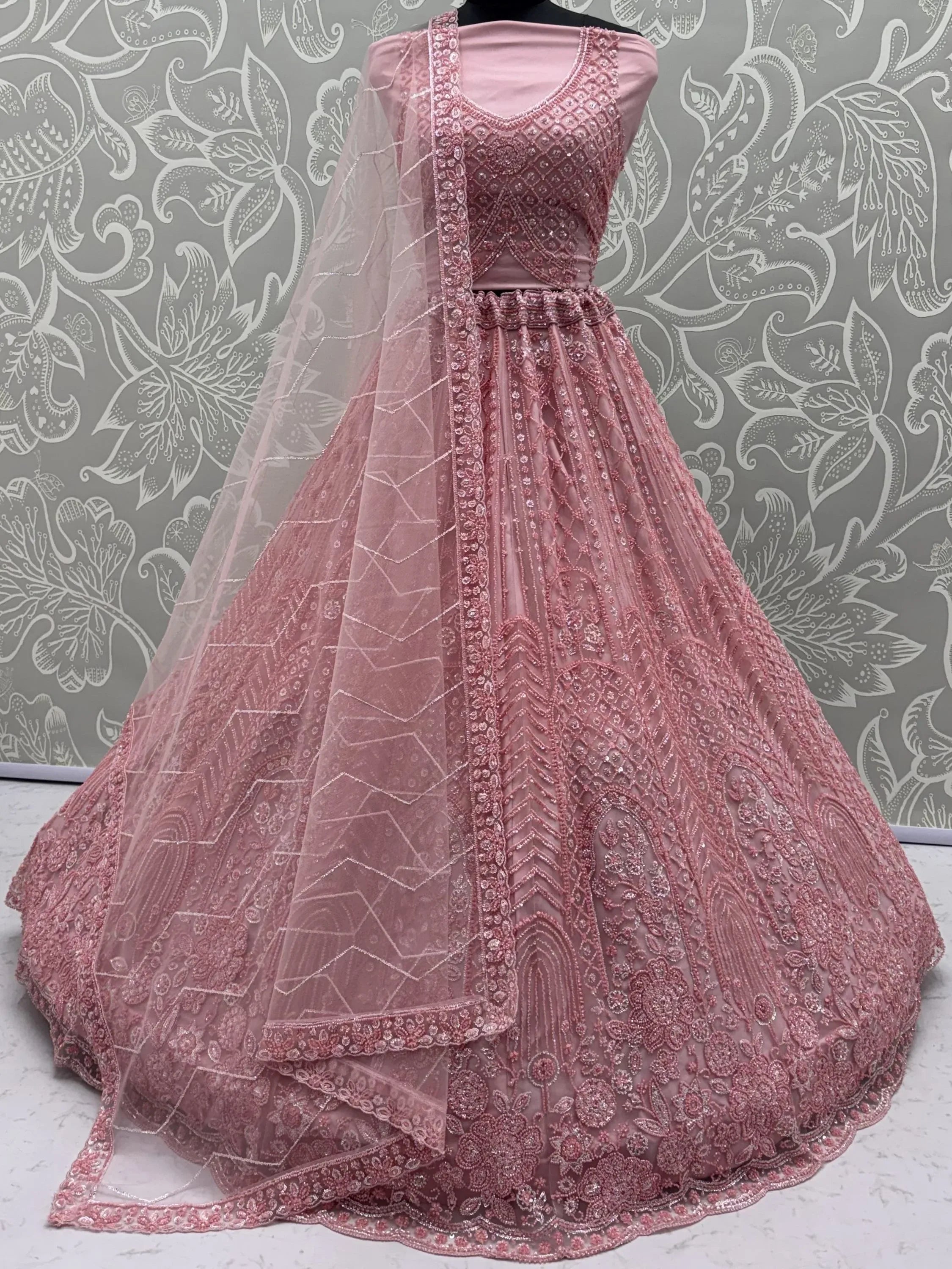 Monochrome Pink Embroidered Net Reception Wear Lehenga Choli
