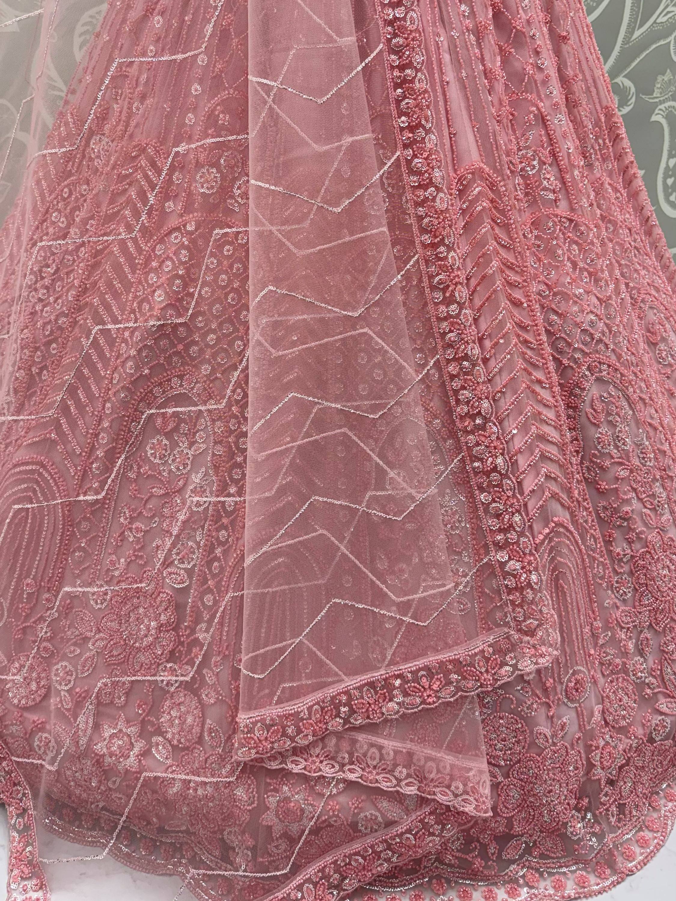 Monochrome Pink Embroidered Net Reception Wear Lehenga Choli