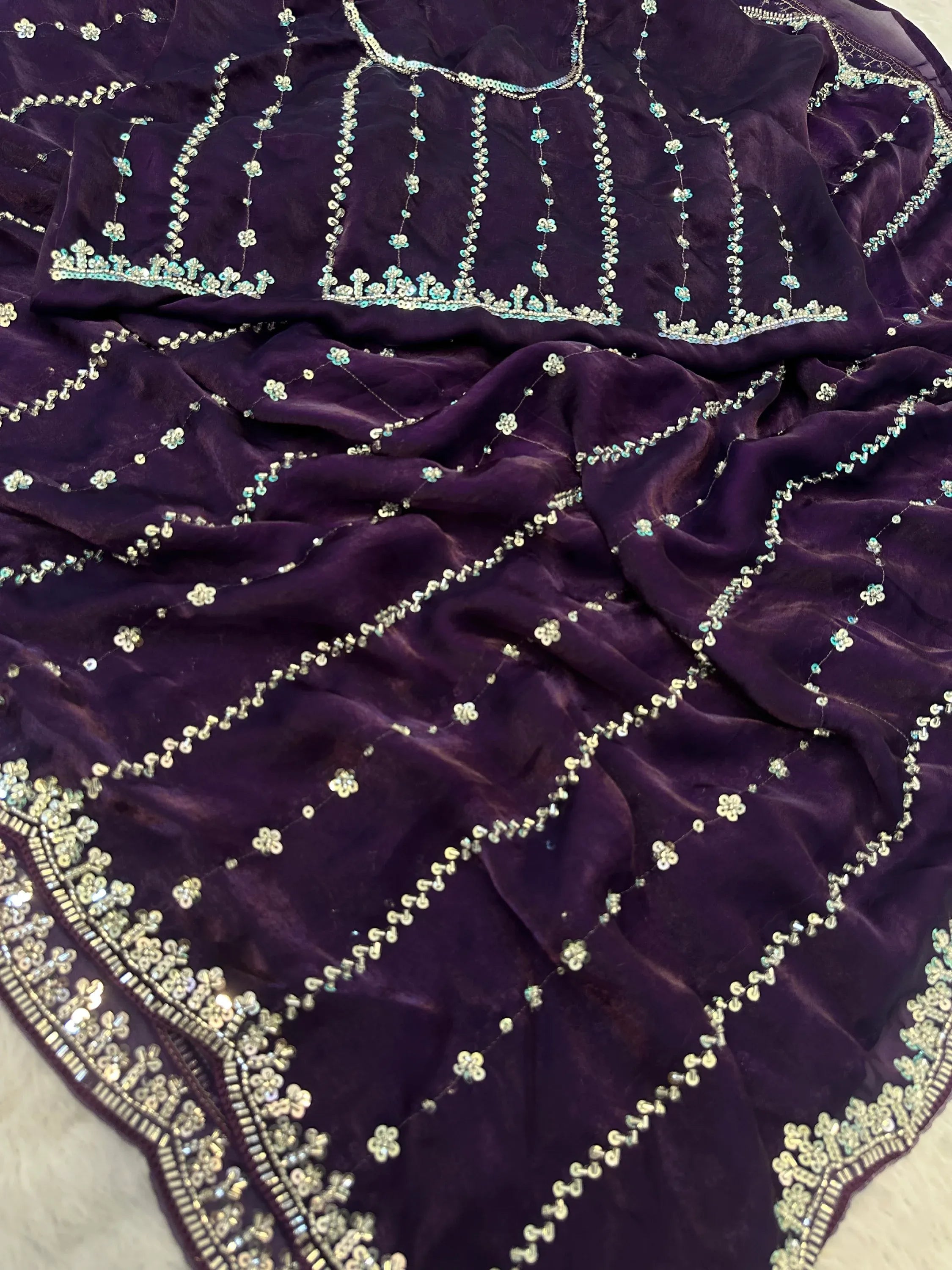 Impressive Purple Embroidered Satin Reception Wear Saree With Blouse
