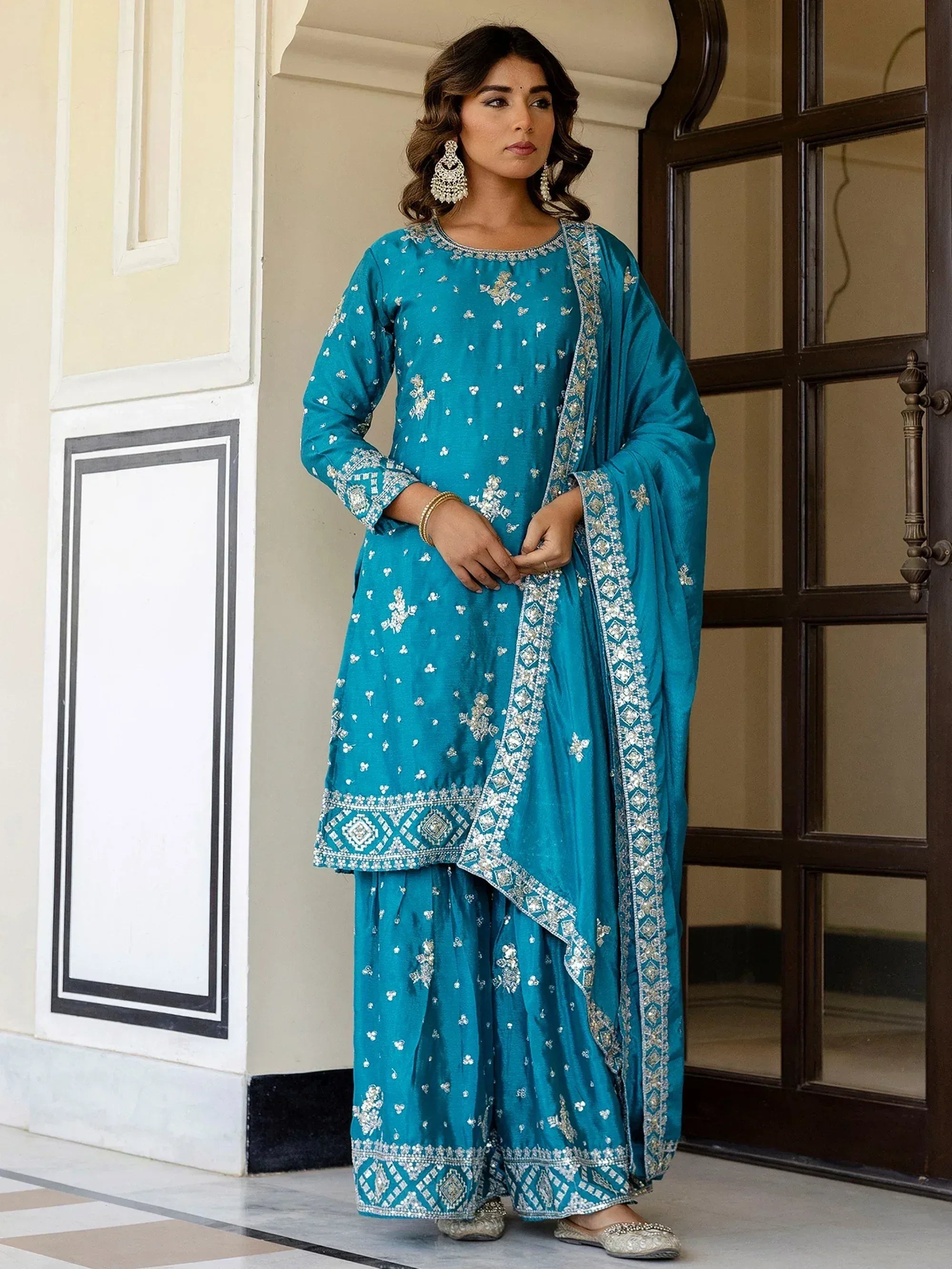 Teal embroidered salwar kameez with matching dupatta, perfect for Indian ethnic wear occasions.