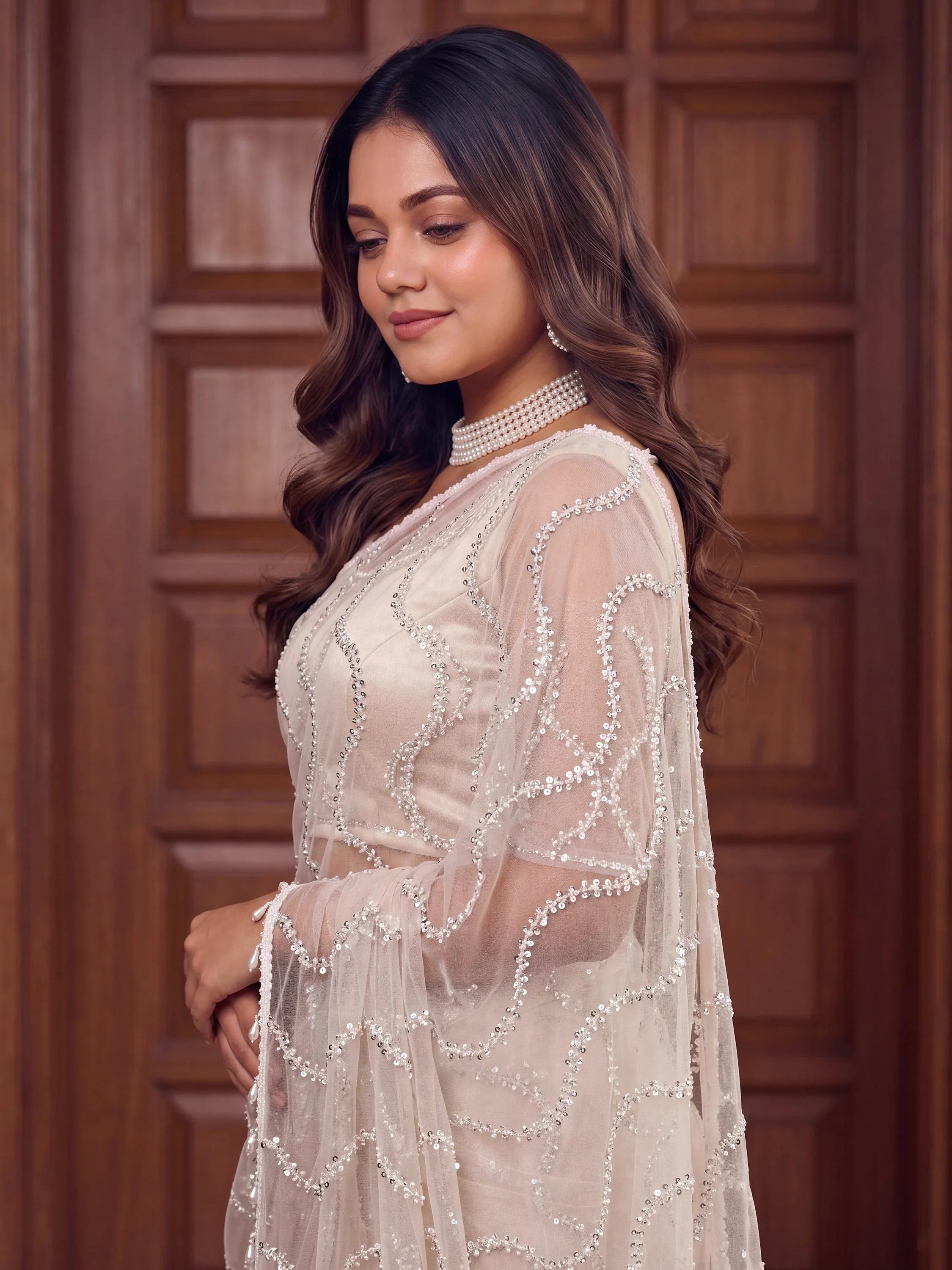 Pretty Off White Peral Work Net Party Wear Saree With Blouse