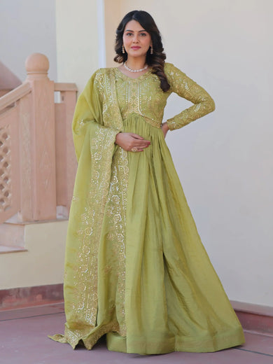 Tantalizing Pista Green Organza Mehendi Wear Gown With Dupatta