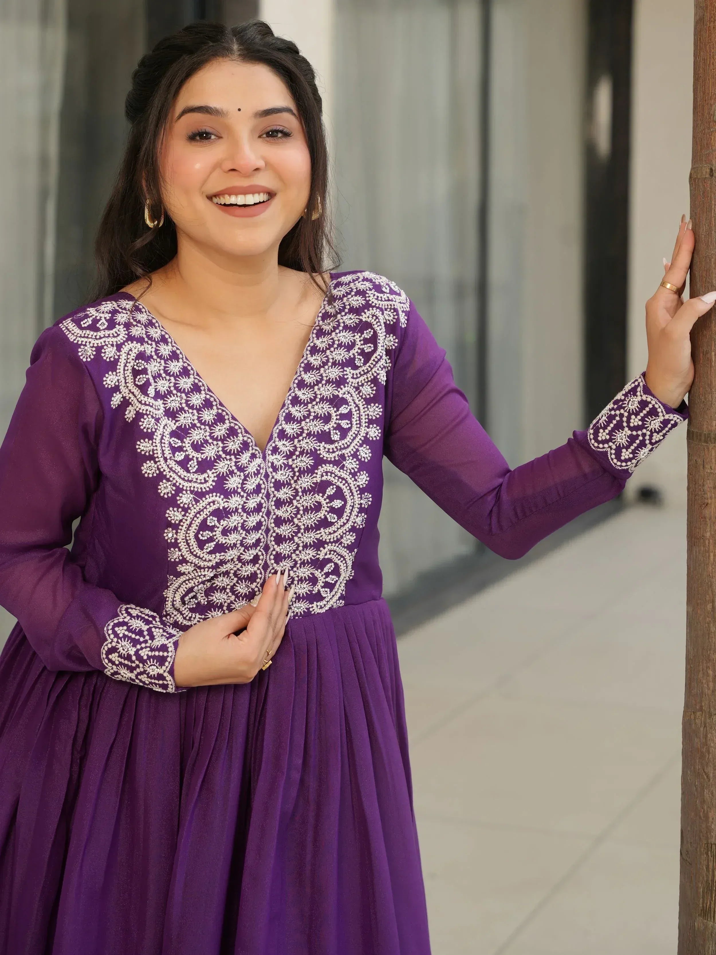 Purple ethnic gown with white embroidery, perfect for Indian occasions and festive wear.
