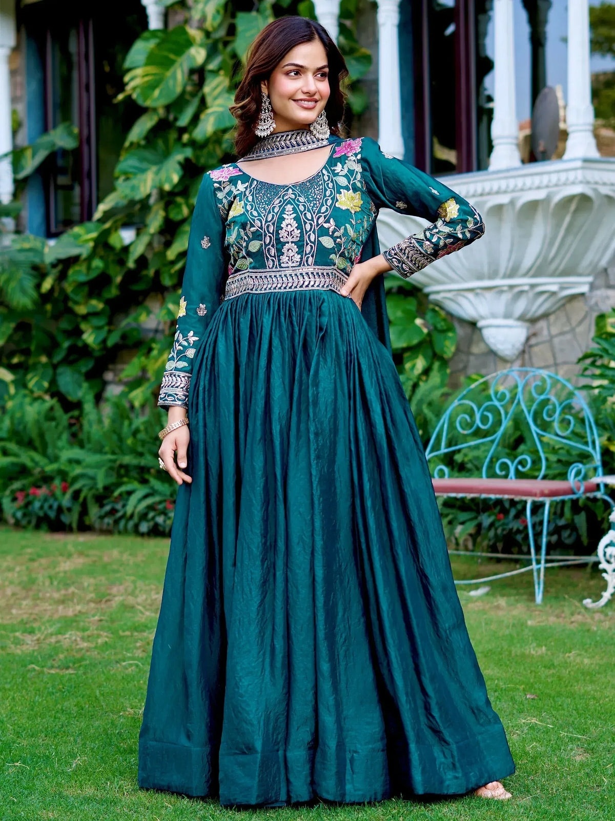 Emerald green embroidered anarkali gown with floral detailing, perfect for Indian ethnic occasions