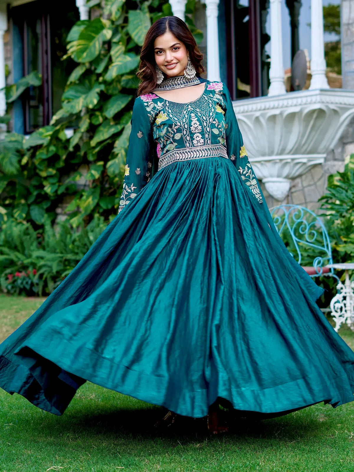 Teal embroidered anarkali gown with floral motifs, perfect for Indian ethnic wear occasions