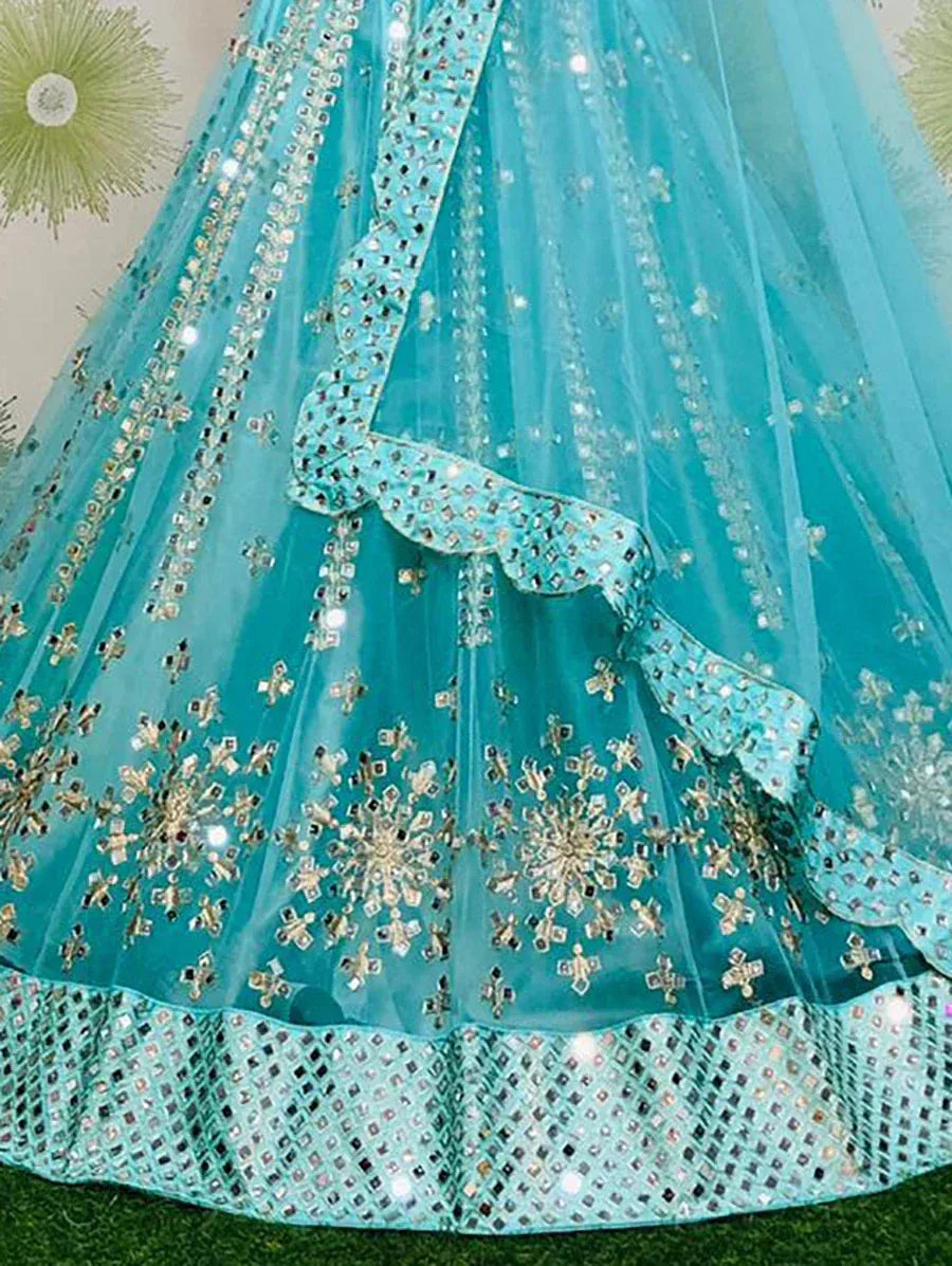 Turquoise designer lehenga with mirror work and floral embroidery, perfect for Indian ethnic wear