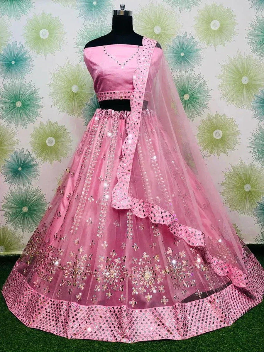 Pink designer lehenga choli with mirror work and net dupatta, ethnic Indian wear for weddings
