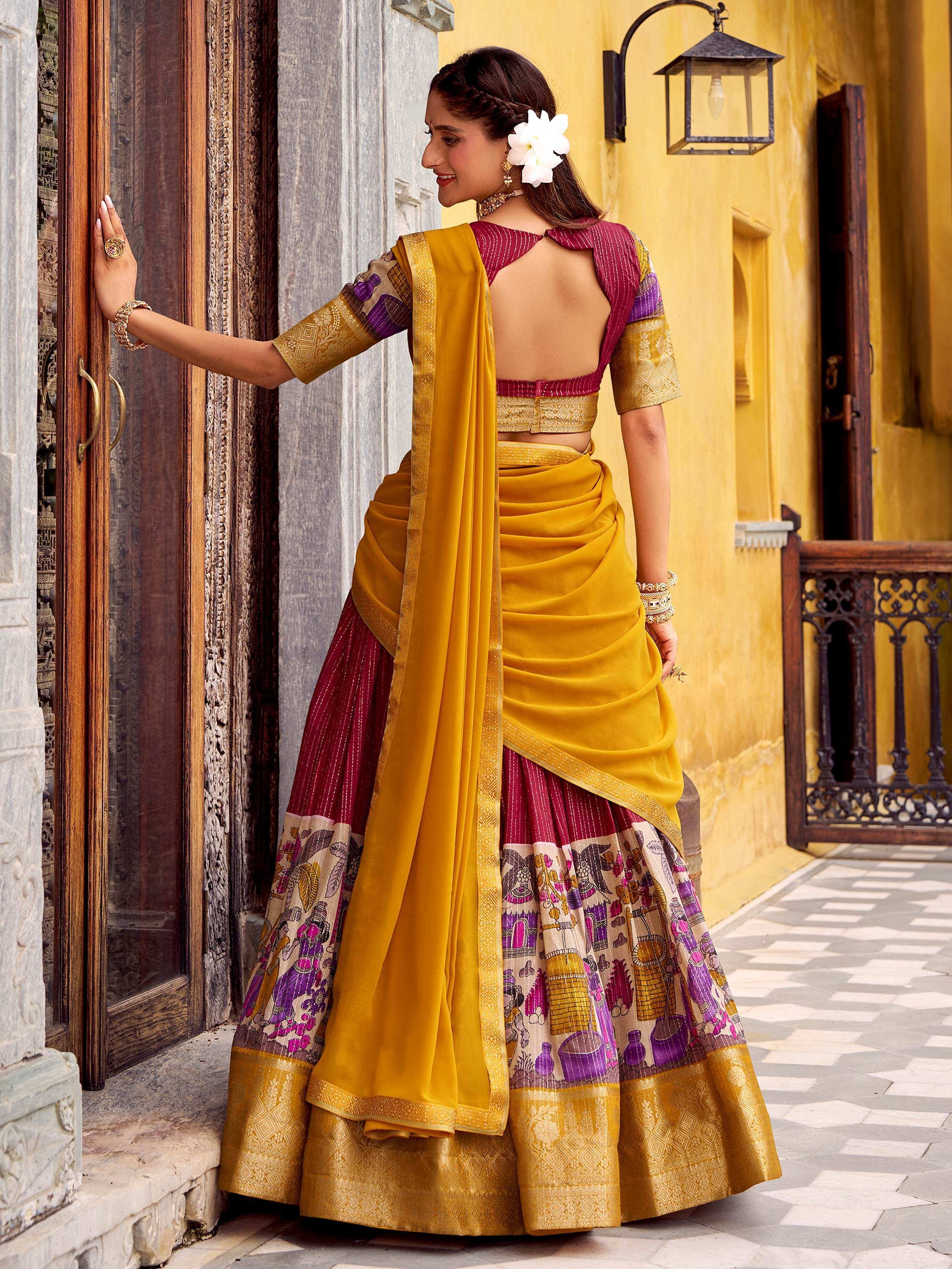 Yellow and maroon designer lehenga choli with printed border, perfect for Indian ethnic wear occasions