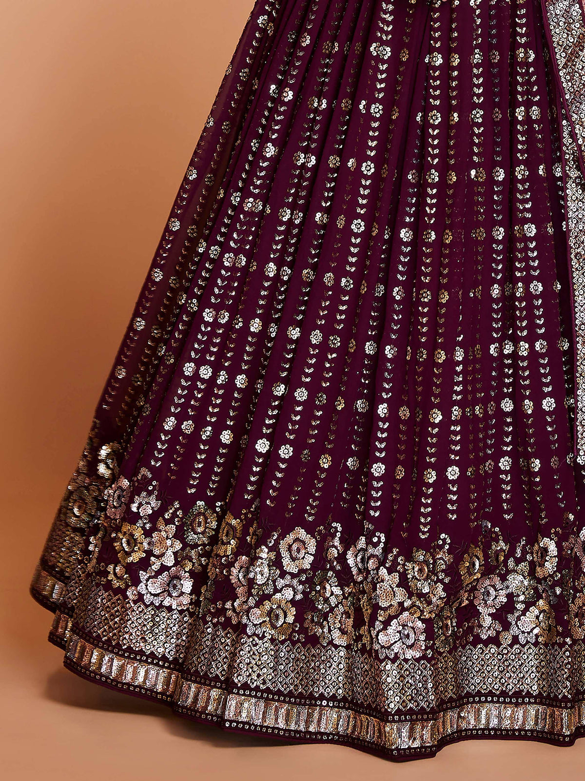 Purple ethnic lehenga with gold and silver floral embroidery and sequin detailing