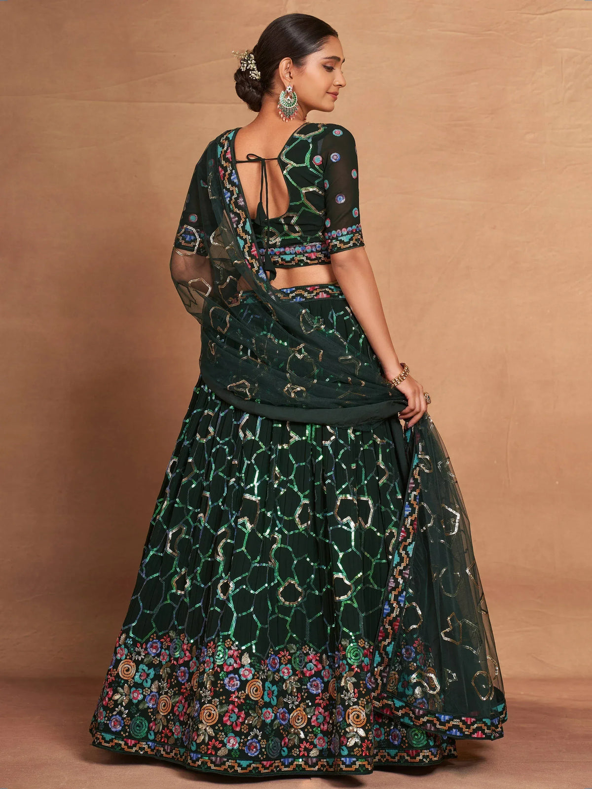 Elegant green lehenga choli with intricate embroidery and floral border, perfect for Indian ethnic wear.