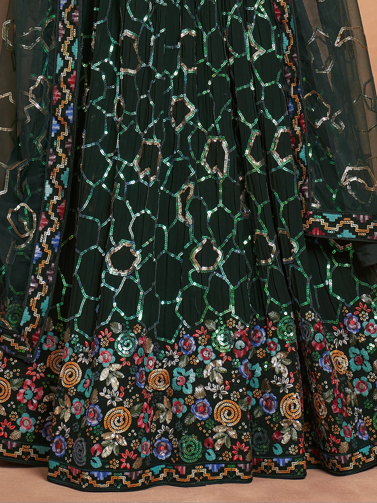 Green embroidered lehenga with floral and geometric sequin patterns, ideal for ethnic wear.