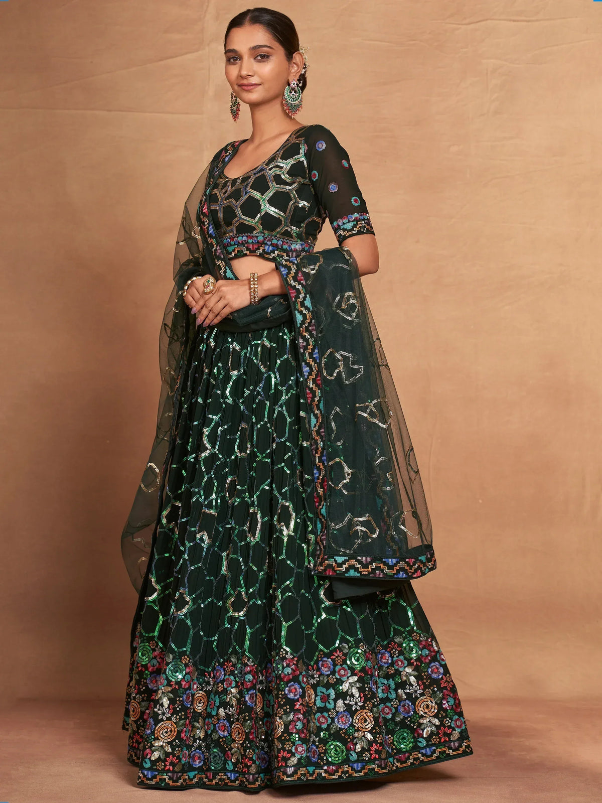 Elegant green embroidered lehenga choli with floral patterns and sheer dupatta for Indian ethnic wear