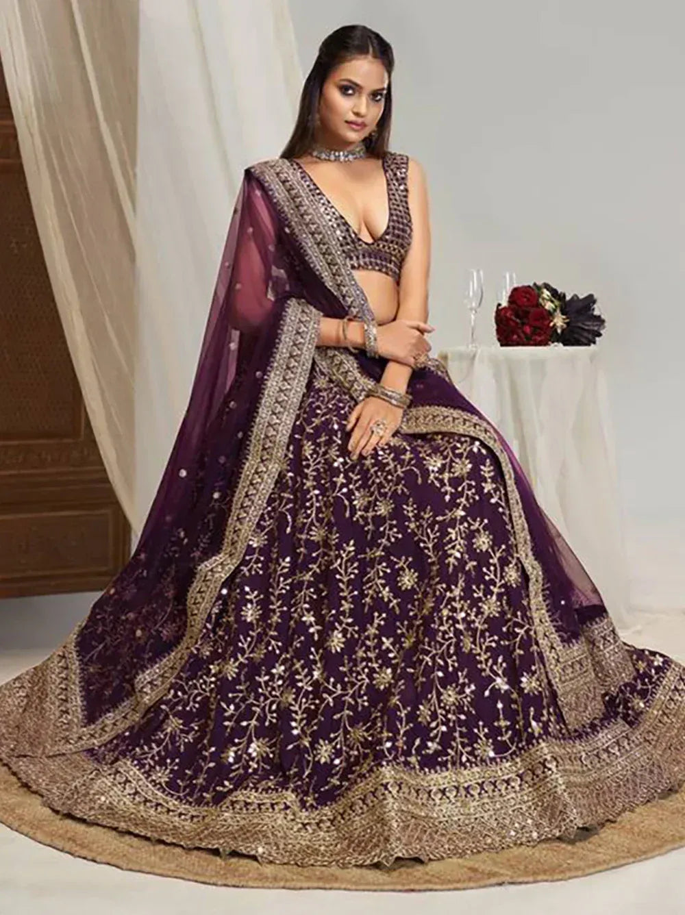 Elegant purple lehenga choli with gold embroidery, perfect for Indian weddings and festive occasions