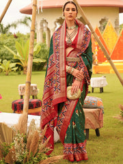 Spectacular Green Patola Printed Silk Wedding Wear Saree With Blouse