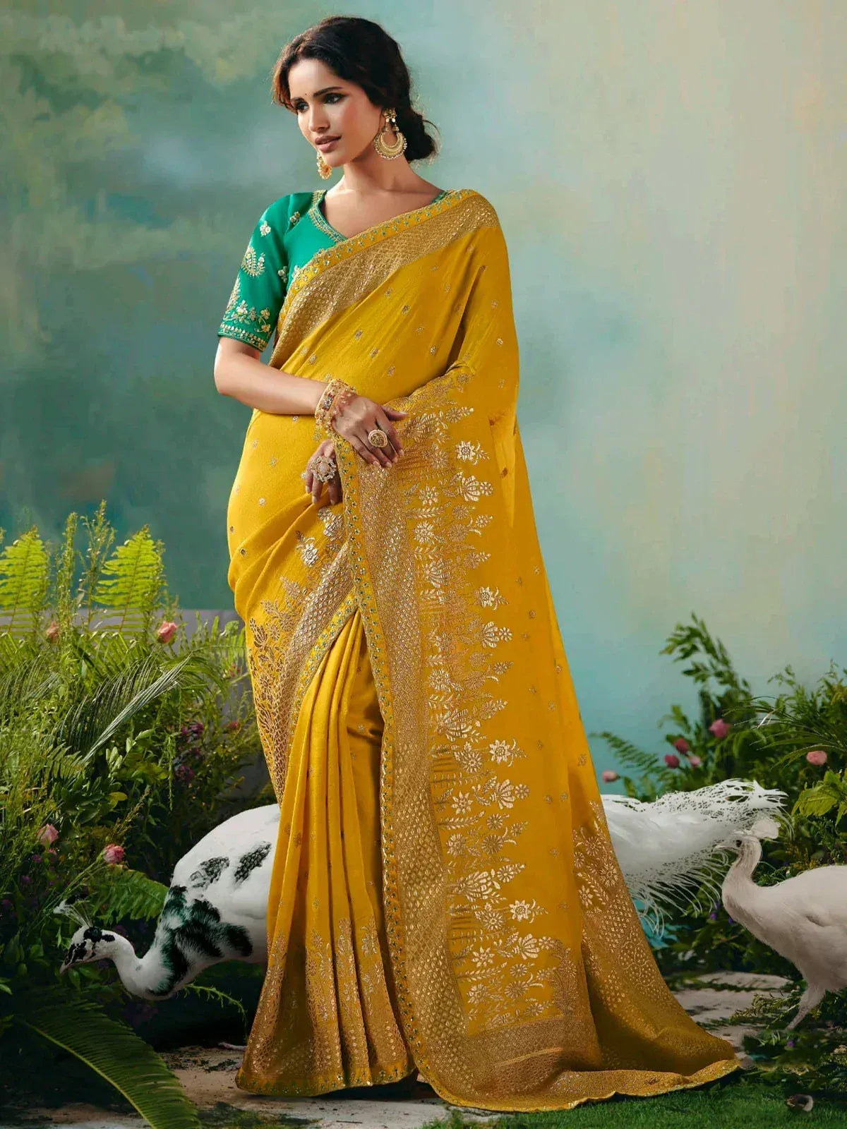 Yellow embroidered saree with green blouse, floral design, perfect for Indian ethnic wear occasions