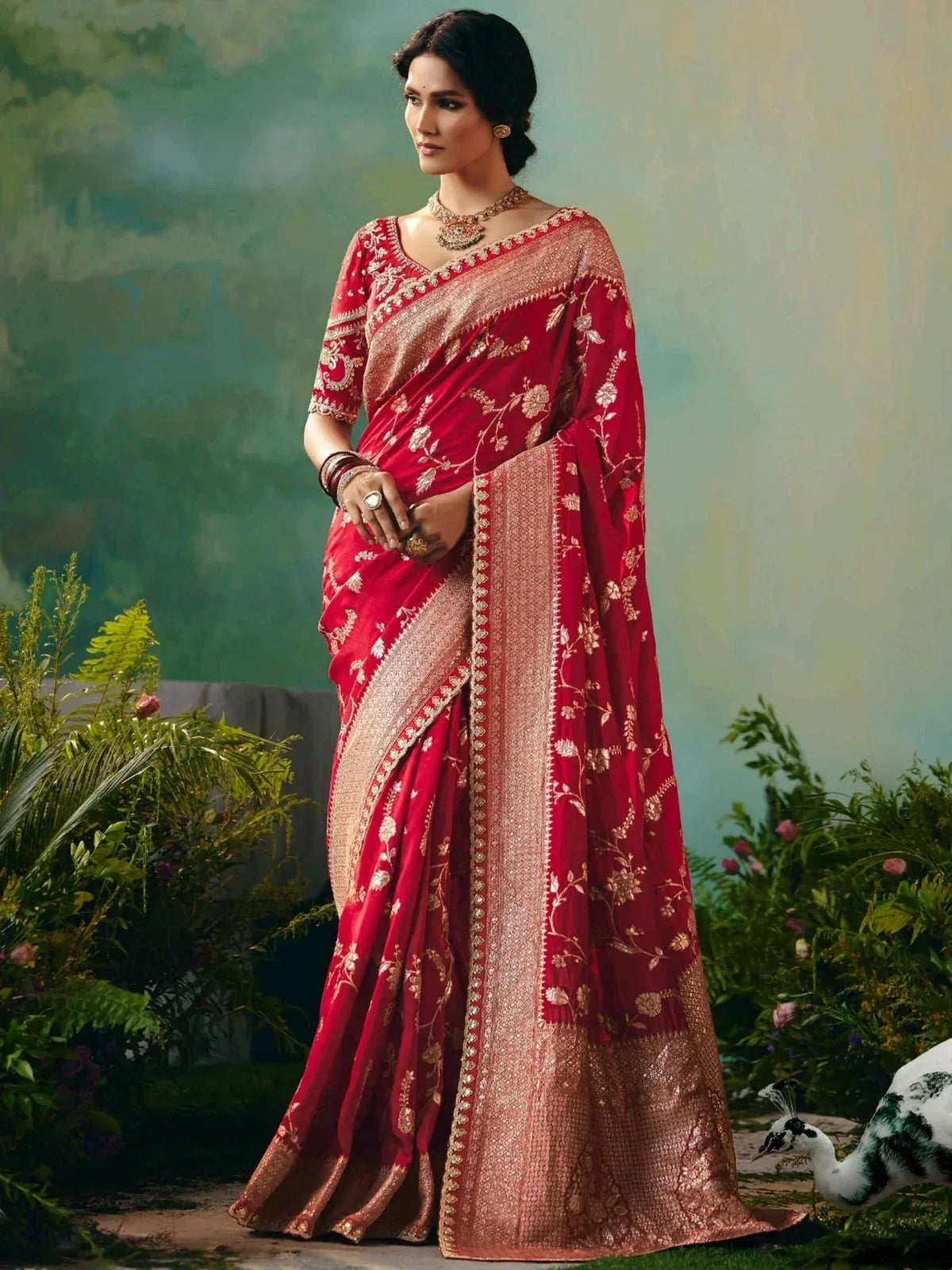 Red embroidered saree with gold floral motifs, perfect for Indian ethnic wear and festive occasions.