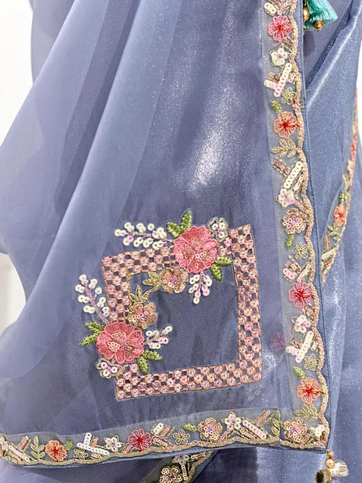 Blue ethnic gown with floral embroidery and sequin detailing