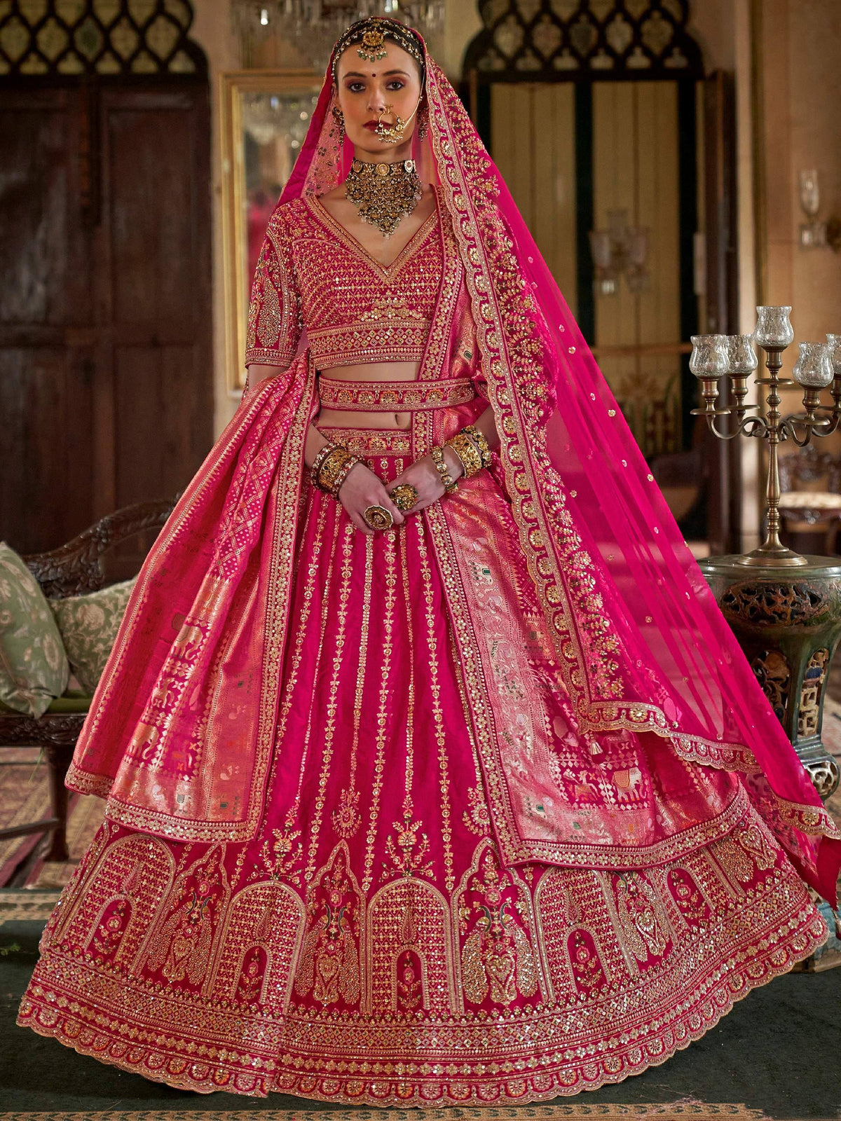 Fuchsia pink bridal lehenga choli with heavy gold embroidery and dupatta, Indian ethnic wear