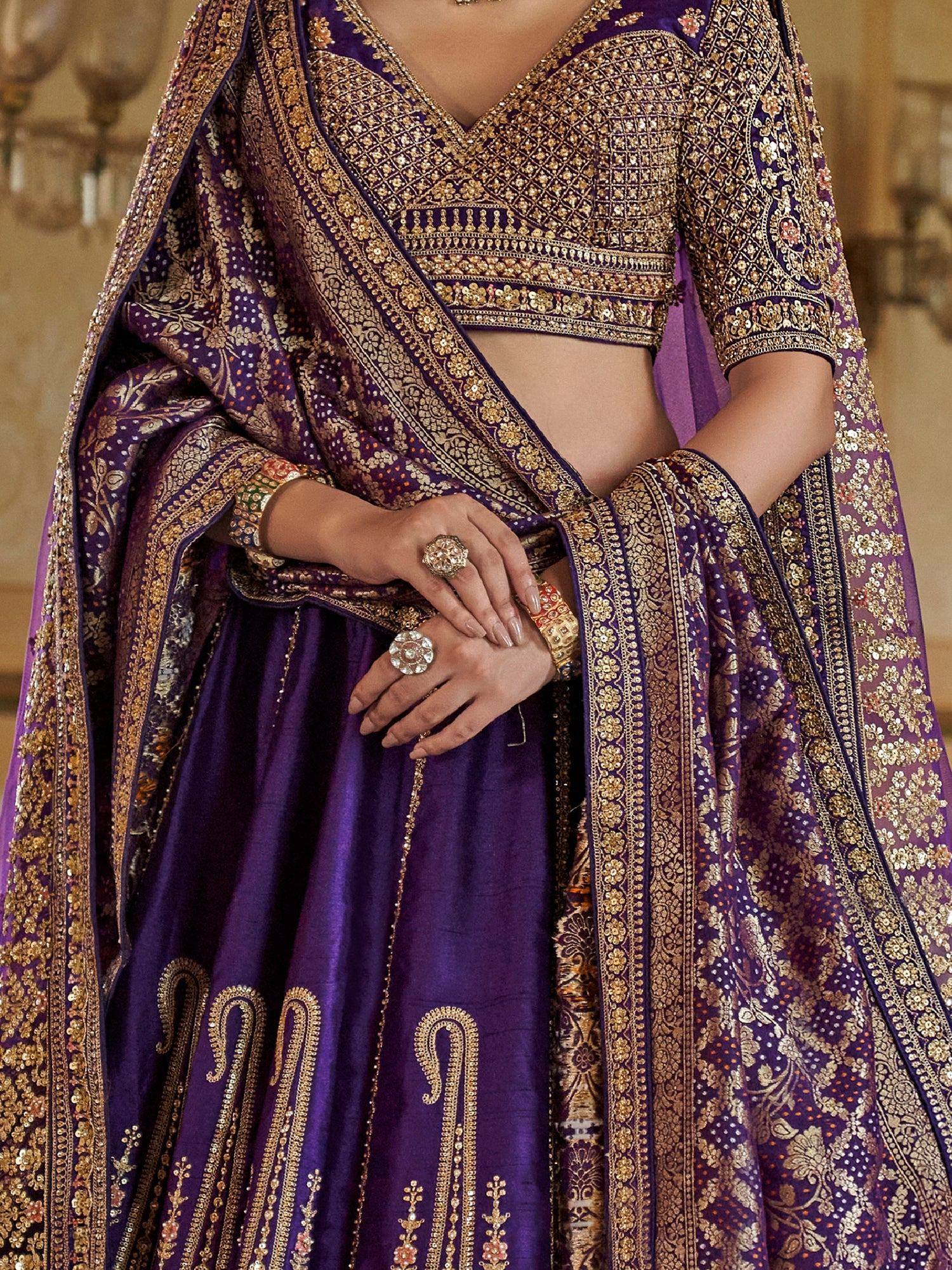 Purple designer lehenga choli with gold embroidery and sequin work, perfect for Indian weddings and festive occasions.