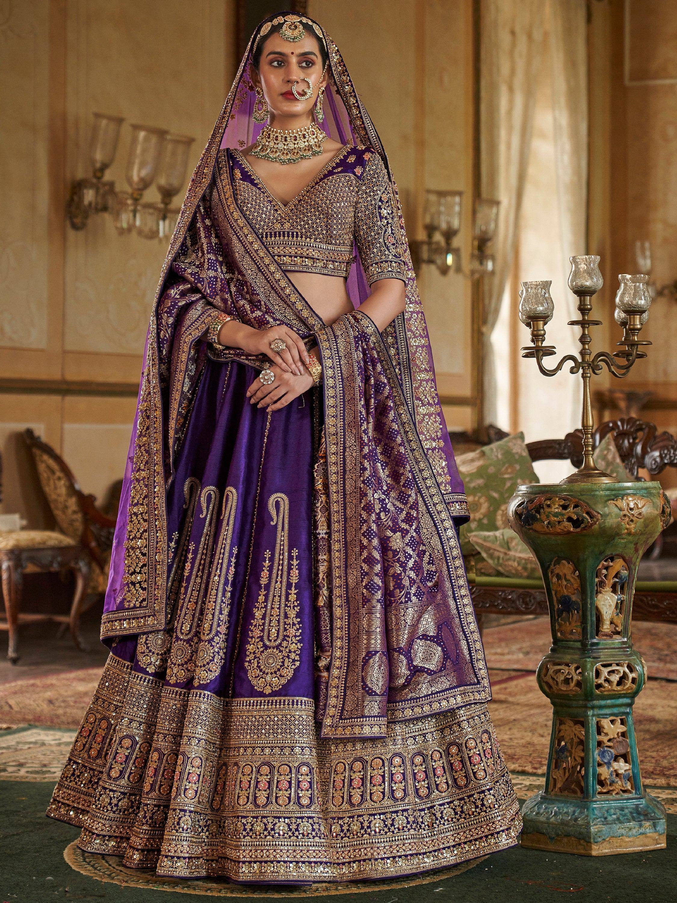 Purple and gold embroidered lehenga choli with dupatta, traditional Indian bridal wear