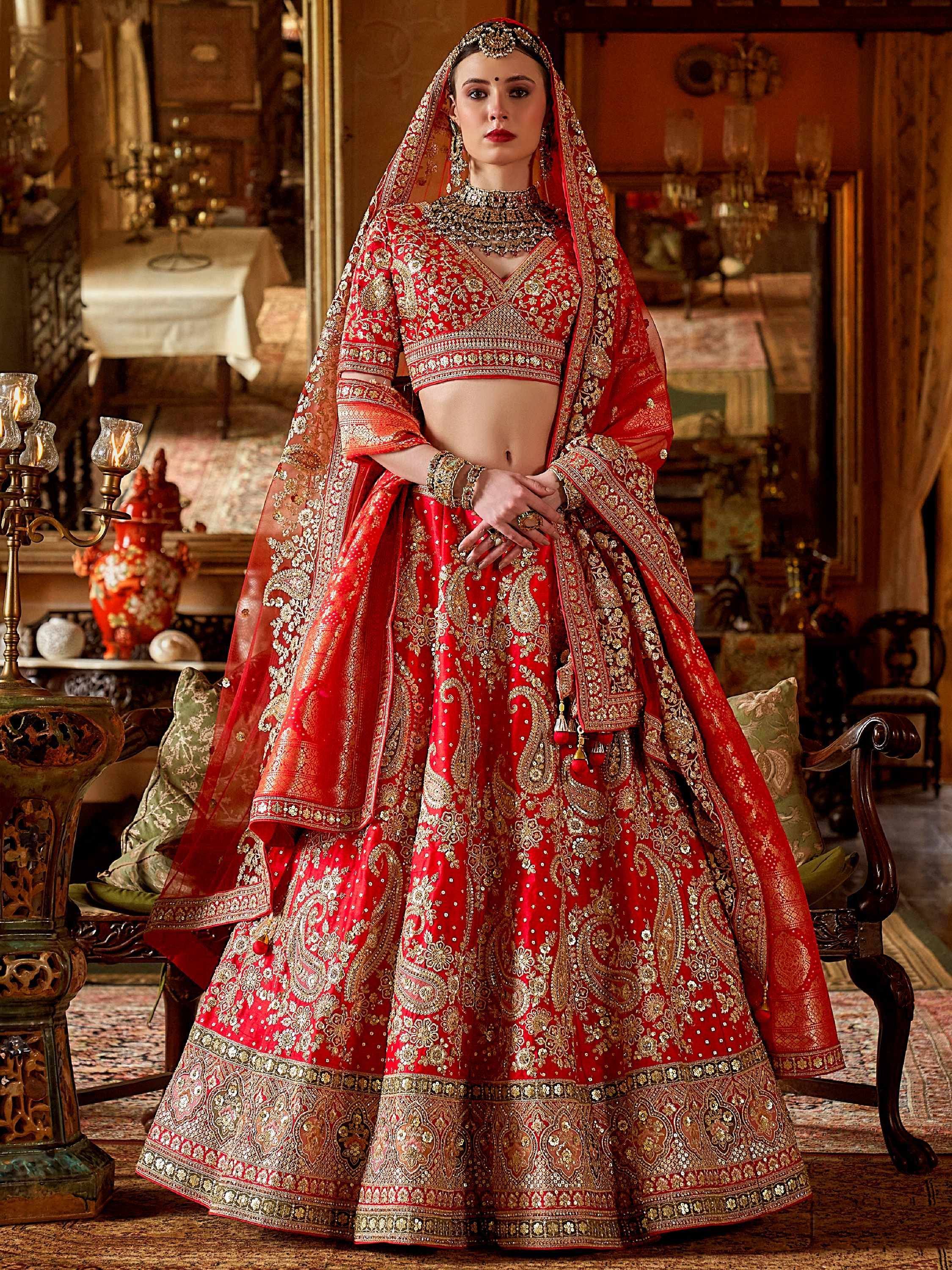 Red and gold embroidered lehenga choli with dupatta, Indian bridal wear