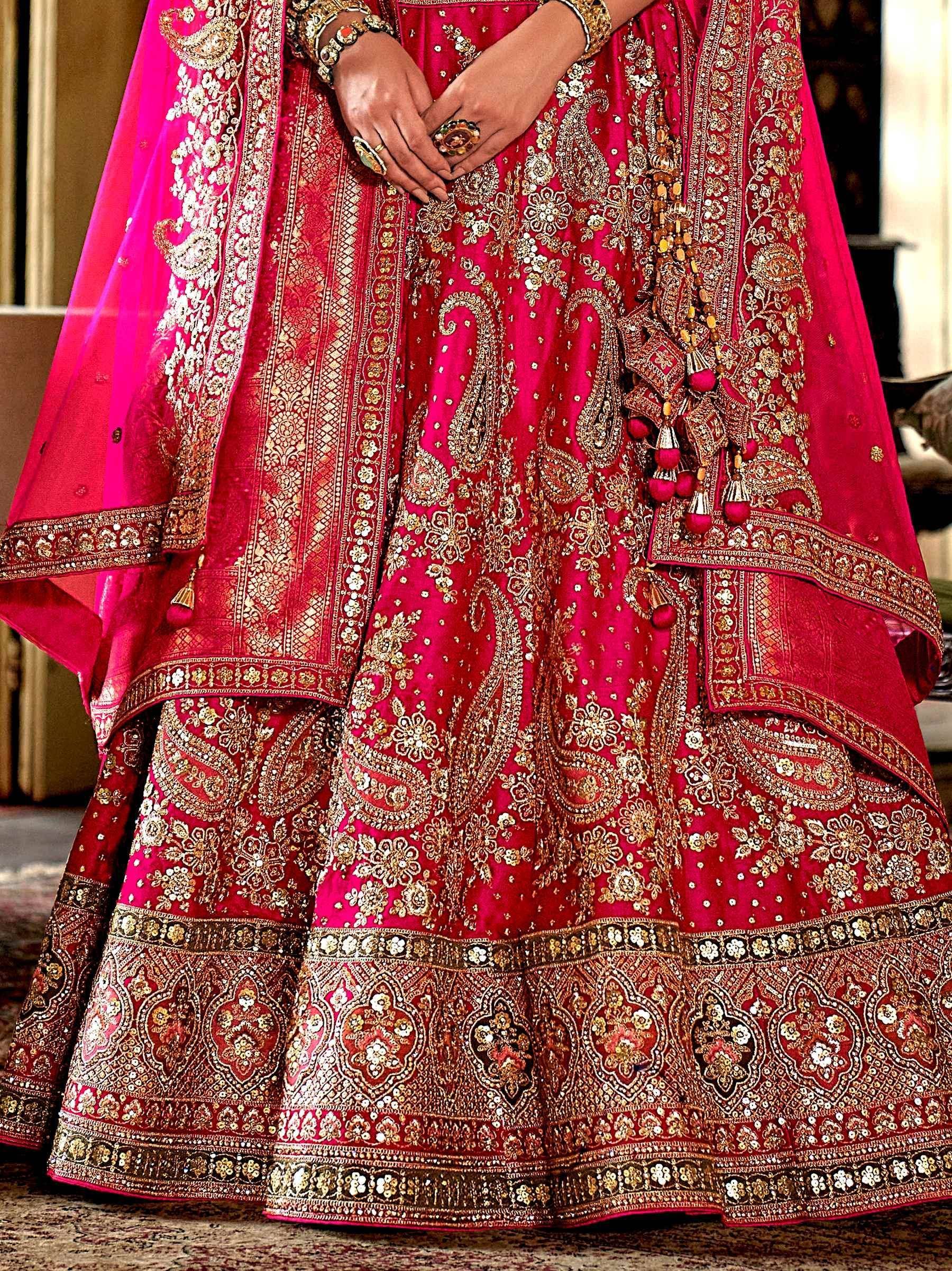Fuchsia designer lehenga choli with gold embroidery and tassels, Indian ethnic wear