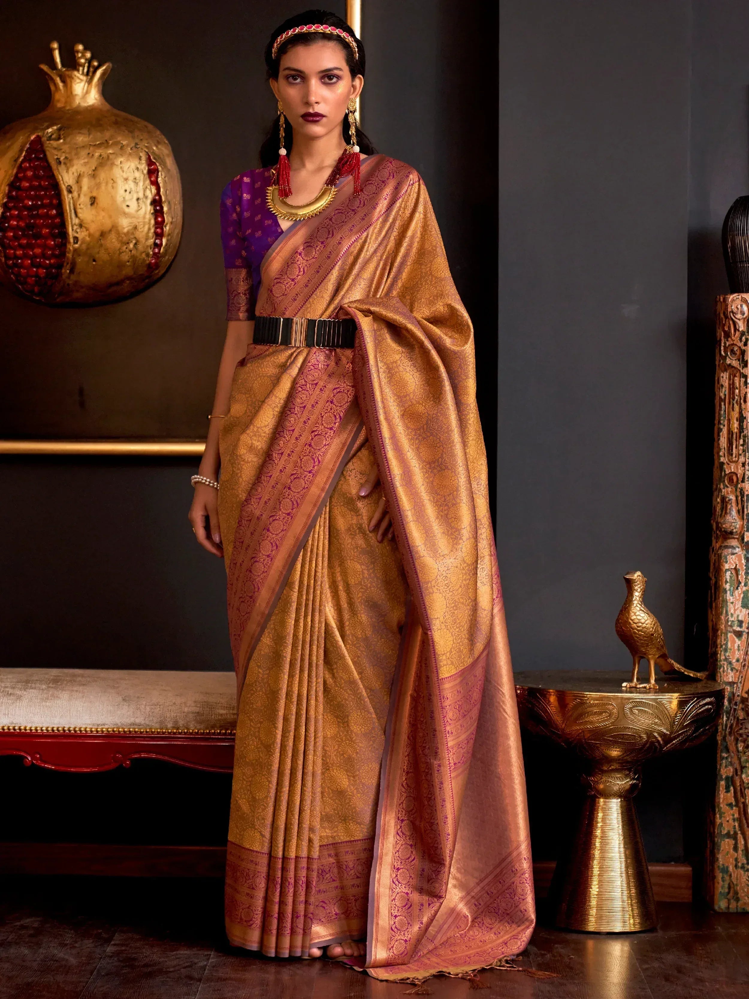 Elegant golden saree with purple blouse, traditional Indian ethnic wear for festive occasions