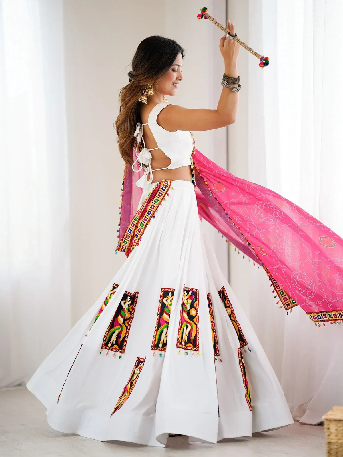 White embroidered lehenga choli with pink dupatta, perfect for Indian ethnic wear and festive occasions
