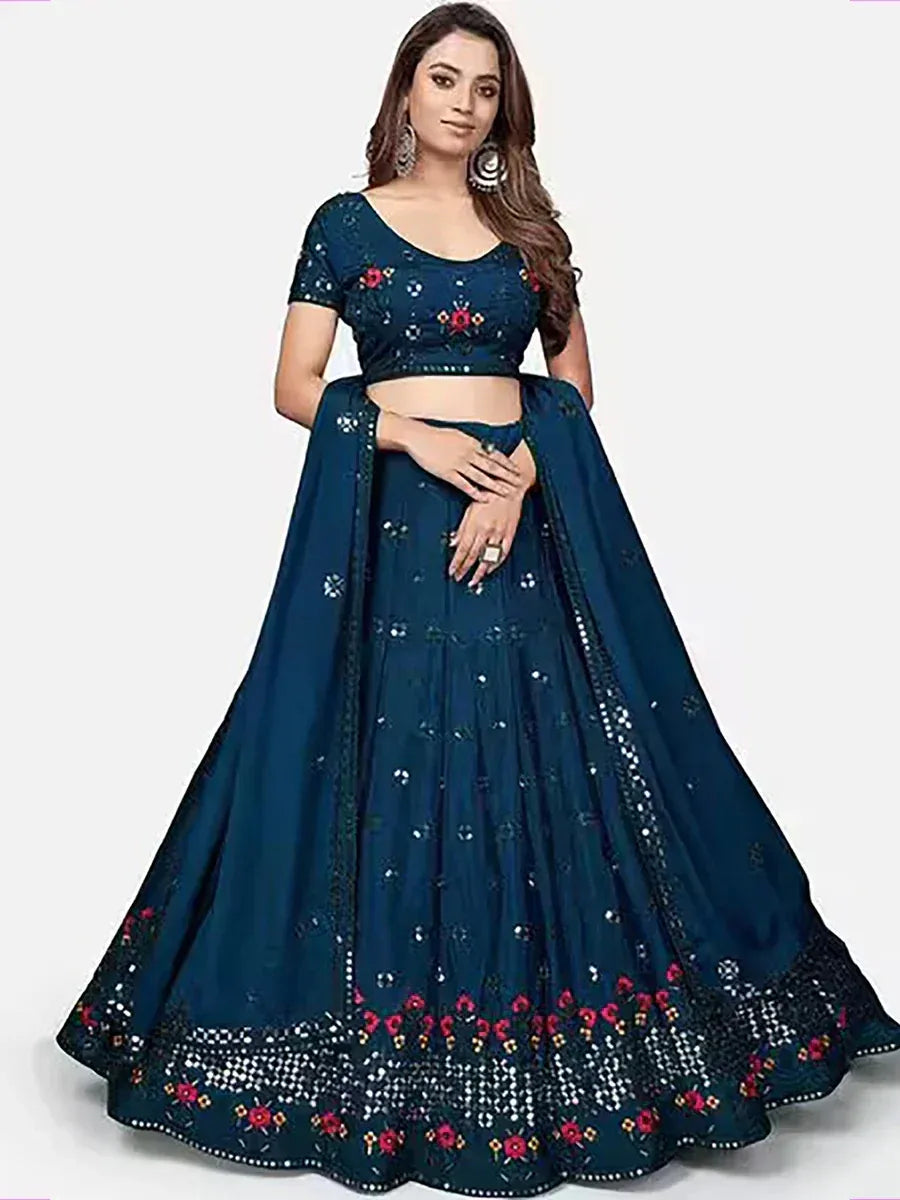 Navy blue designer lehenga choli with floral embroidery and mirror work, perfect for Indian ethnic occasions