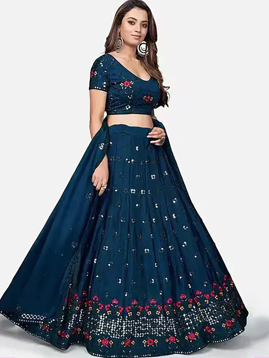 Dark blue embroidered lehenga choli with floral motifs and mirror work, perfect for Indian ethnic occasions