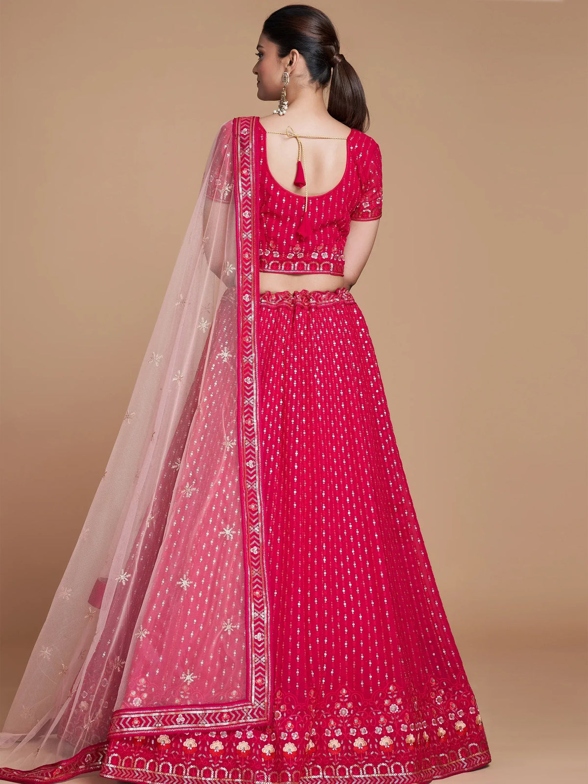 Red embroidered lehenga choli with sheer dupatta, perfect for Indian ethnic wear occasions