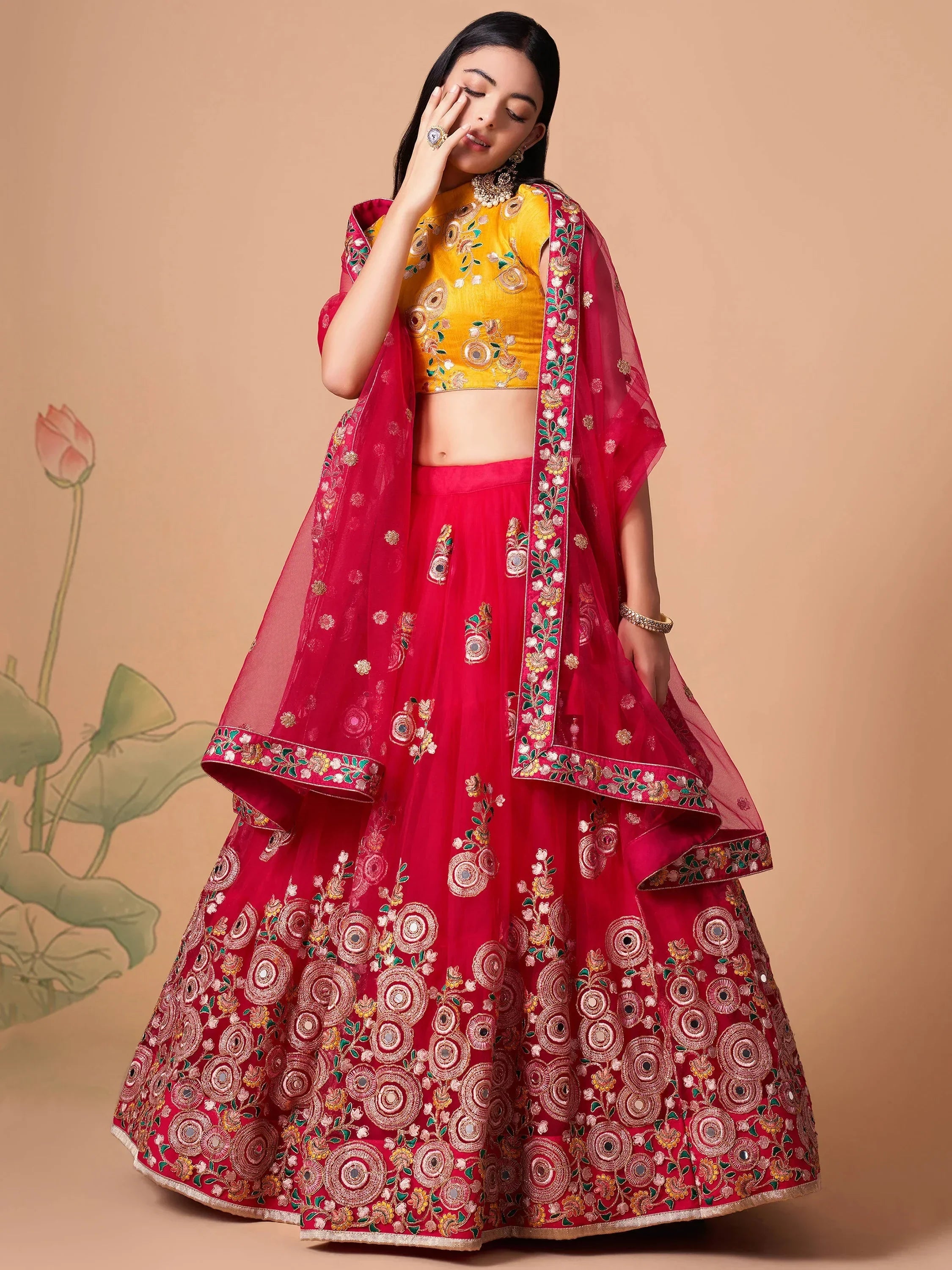 Vibrant Pink embroidered Net Designer Lehenga choli