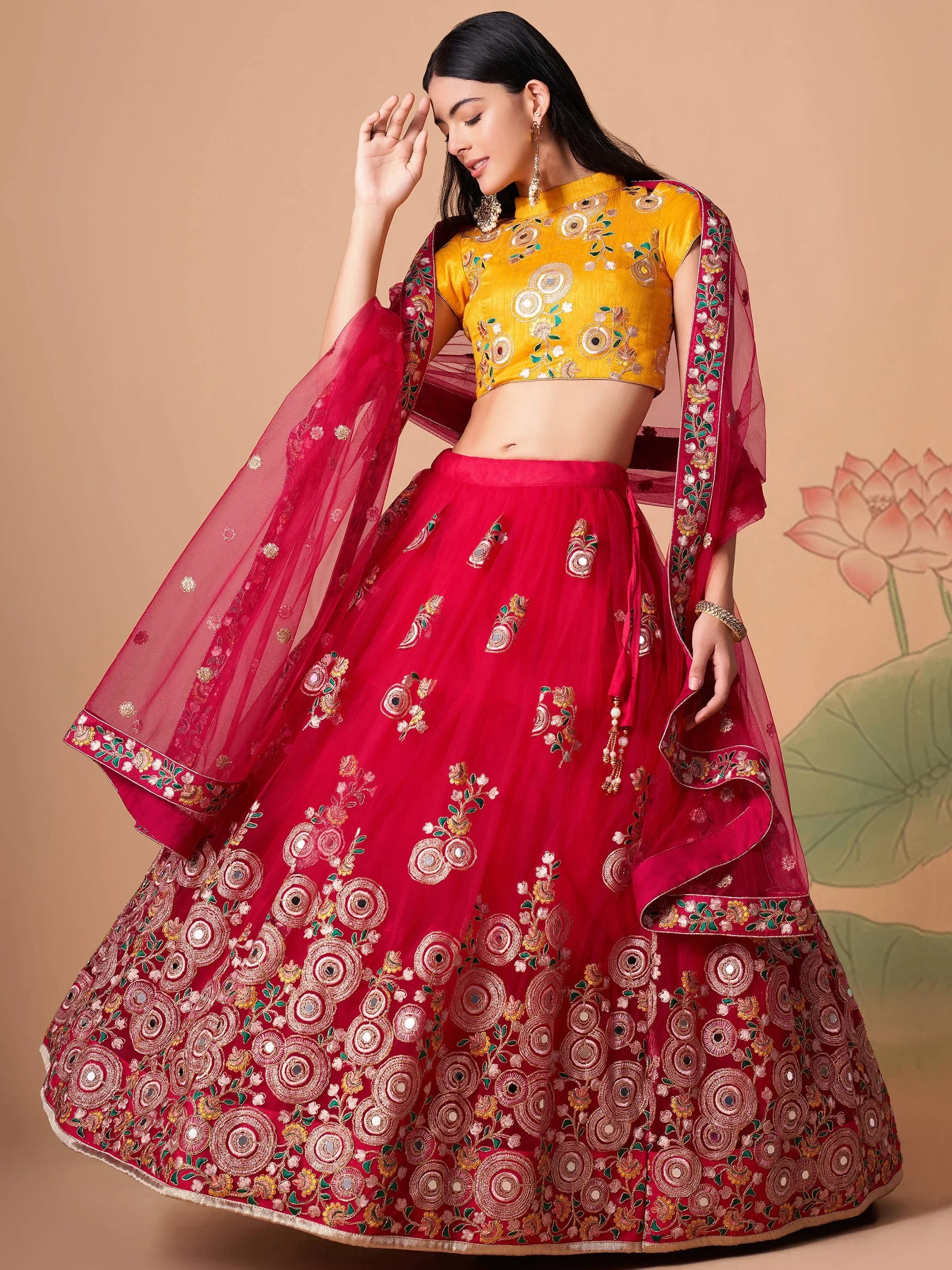 Vibrant Pink embroidered Net Designer Lehenga choli