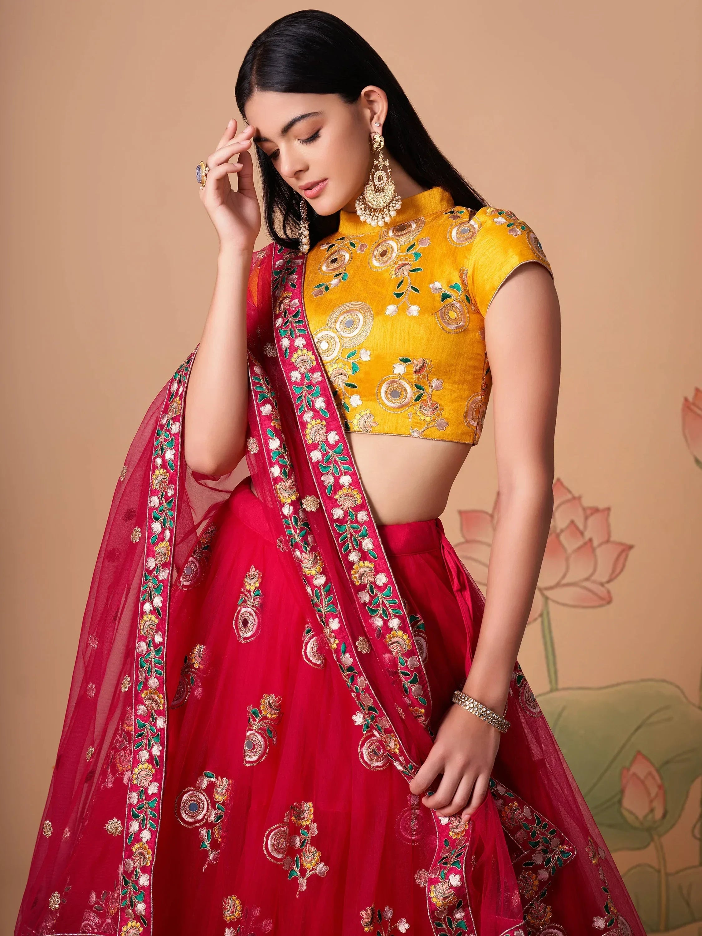 Vibrant Pink embroidered Net Designer Lehenga choli