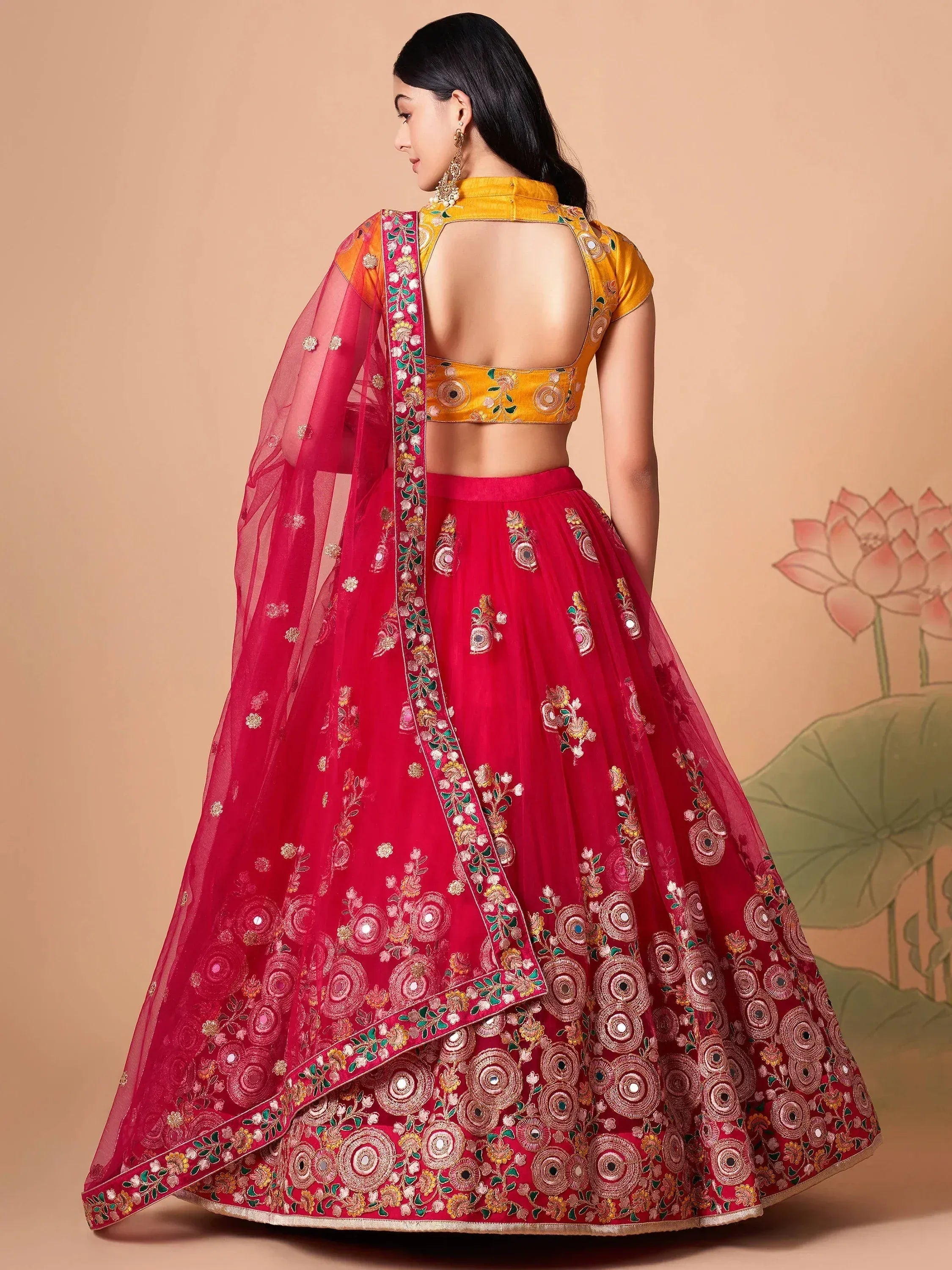 Vibrant Pink embroidered Net Designer Lehenga choli