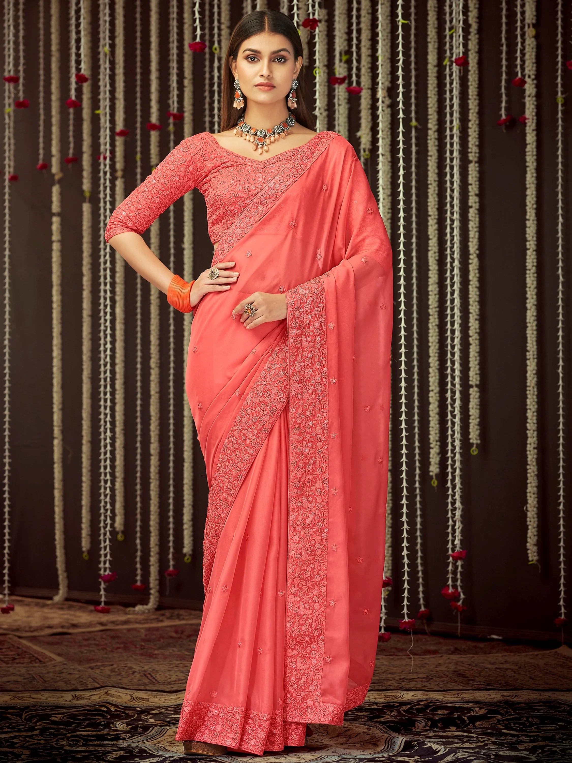 Impressive Peach Thread Embroidered Georgette Festival Wear Saree