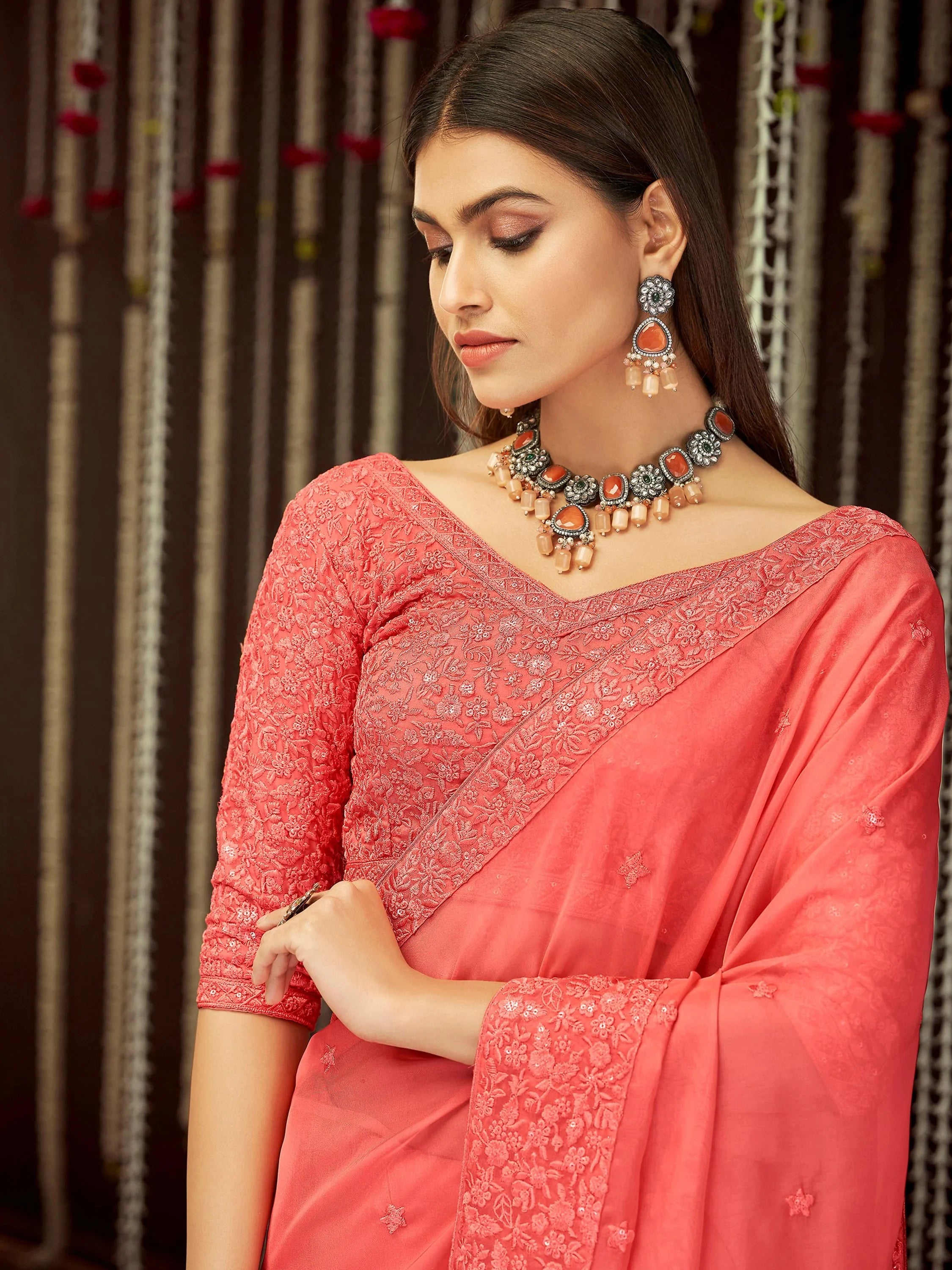 Impressive Peach Thread Embroidered Georgette Festival Wear Saree