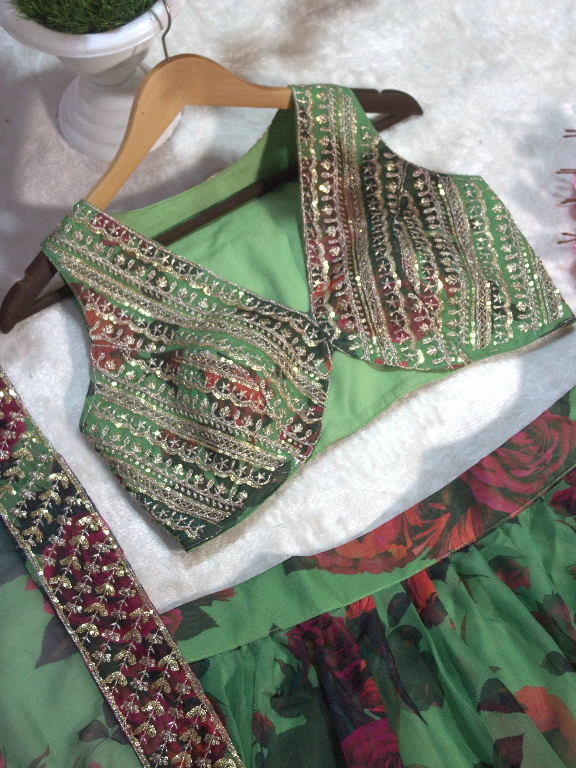 Green floral lehenga choli with gold embroidery and sequin detailing