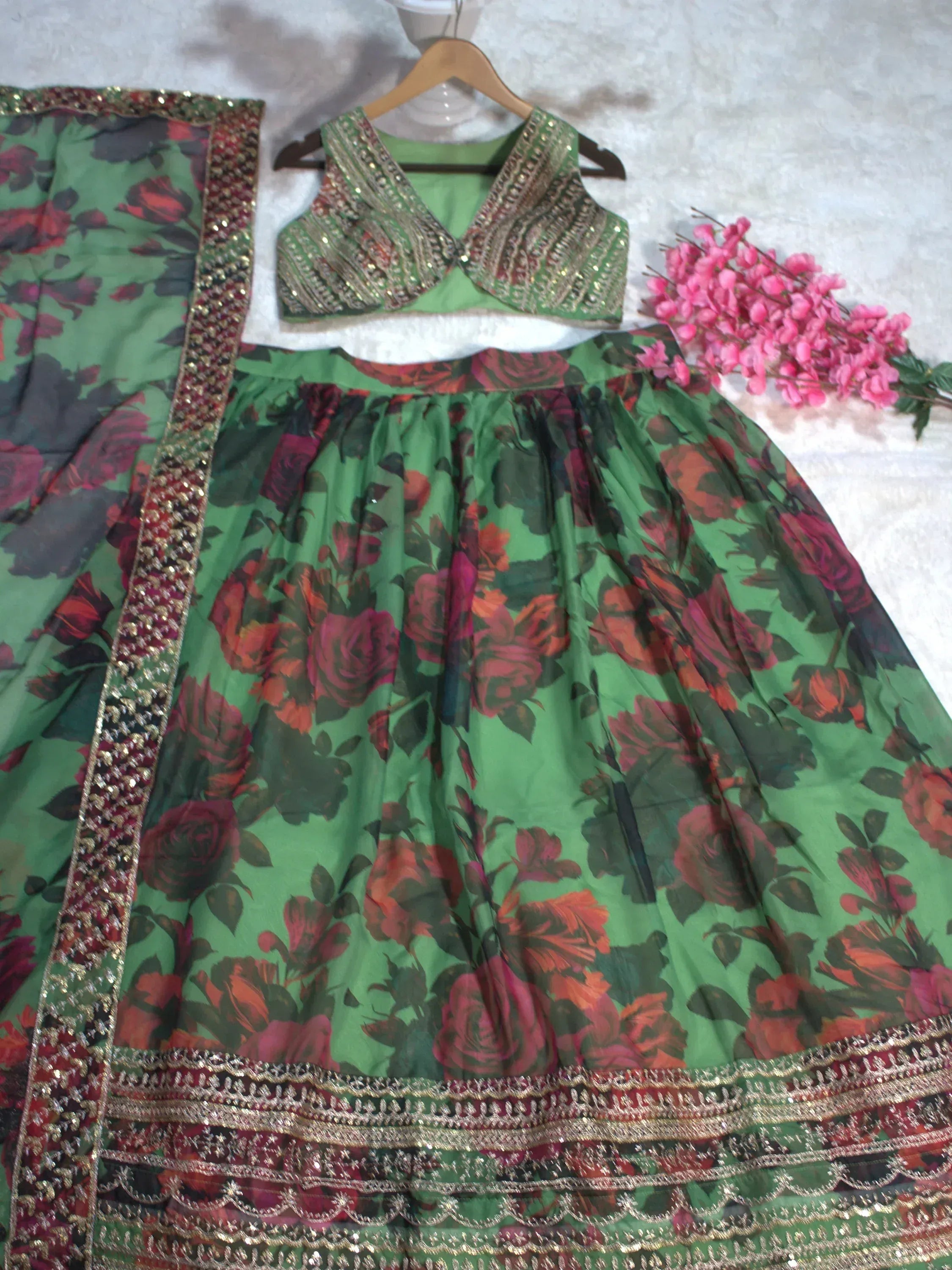 Green floral lehenga choli with gold embroidery, perfect for Indian ethnic wear occasions