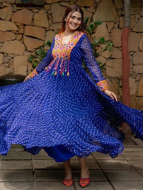 Blue polka dot ethnic gown with colorful embroidery, perfect for festive occasions