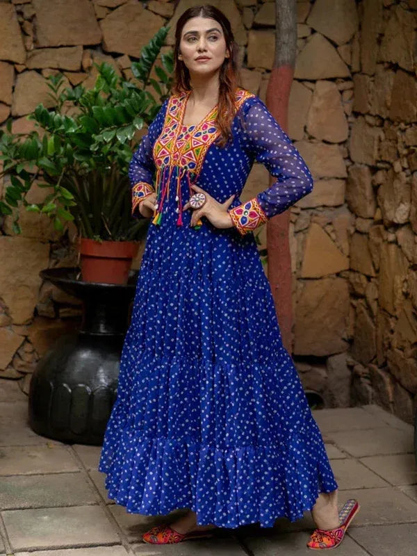 Blue polka dot ethnic gown with colorful embroidery, perfect for festive occasions