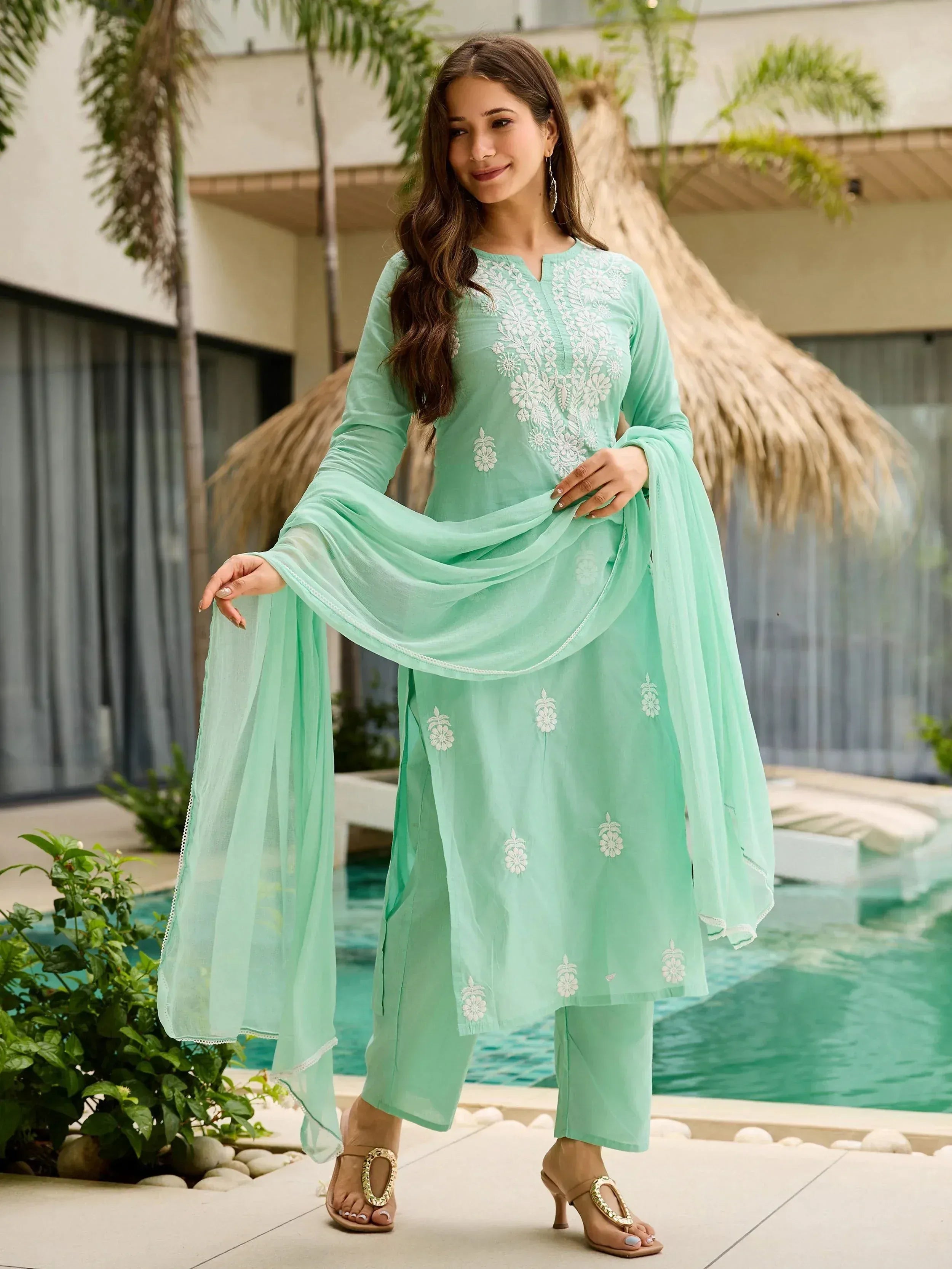 Mint green embroidered salwar kameez with matching dupatta, perfect for ethnic occasions