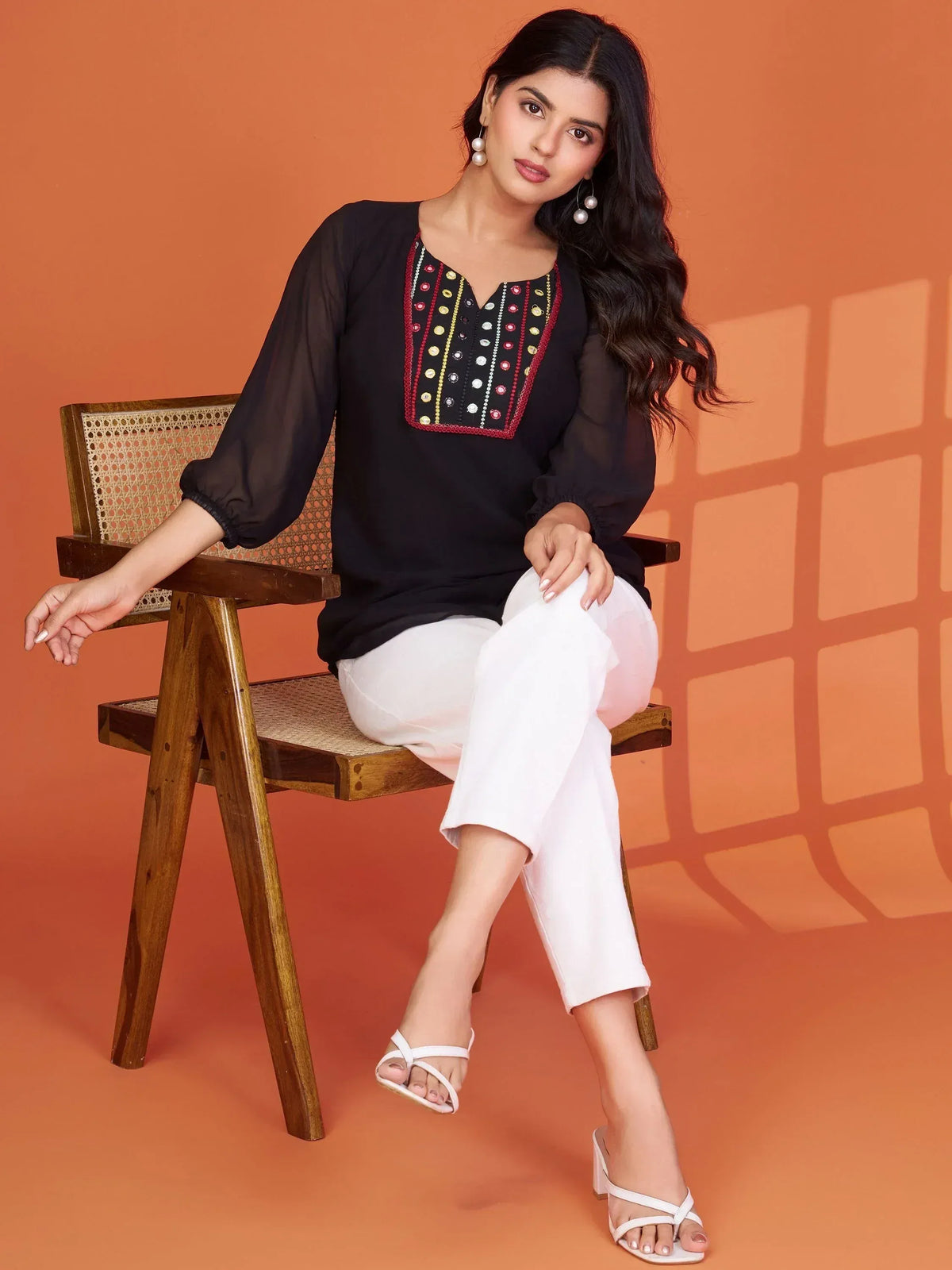 Black embroidered kurta with white palazzo pants, ethnic wear for women